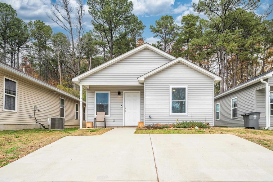 Very cute newer home built in 2021! Would be perfect investment or starter home! Conveniently located in the middle of town! Minutes to Oaklawn, shopping, hospitals and restaurants! All electric, granite countertops, LVP flooring, his/her closets, and primary bedroom fits king sized bed with lots of space left! Extra space in the attic for more storage!! Don't miss out on this one!