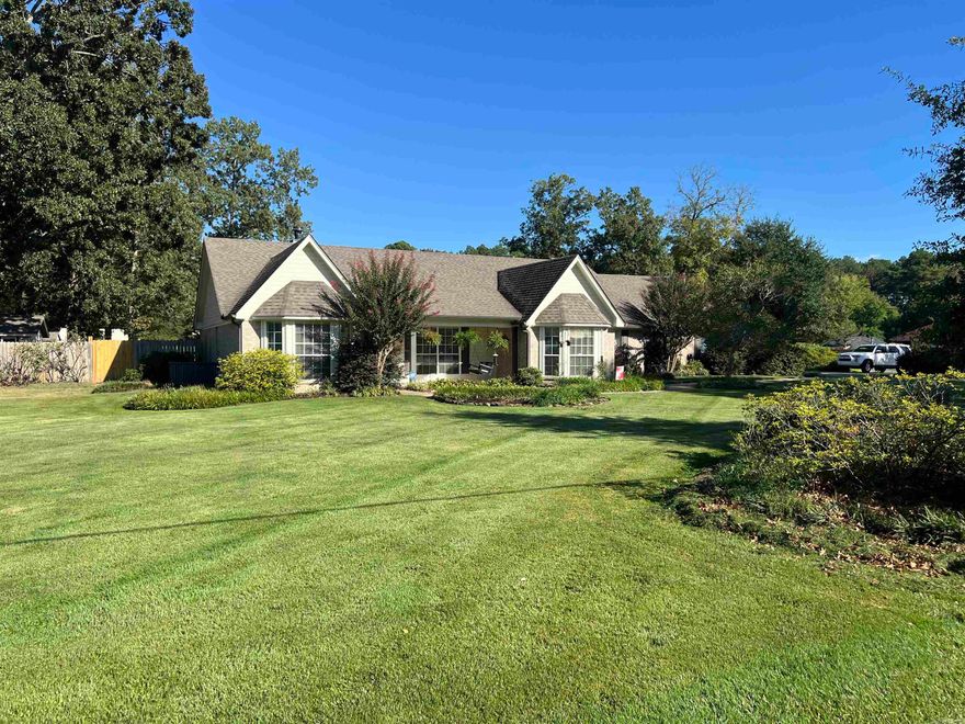 Immaculately maintained and custom built, this beautiful one-owner three-bedroom, two-bath brick home sits on almost an acre corner lot and is truly move-in ready. The backyard is a private oasis featuring a sparkling 18x36 swimming pool, pergola, extra landscaping, a 12x16 shop, and a fully fenced yard with in-ground irrigation. Recent updates include new gutters, a newer roof, and a 30-amp outlet ready for a generator (not included). Inside, you’ll find a split floor plan with a spacious living room highlighted by tray ceilings, a cozy wood-burning fireplace, and newer hardwood floors. The large master suite offers a garden tub, separate shower, and generous closet space, while the two spare bedrooms are nicely sized. The updated kitchen is a chef’s dream with granite countertops, abundant cabinetry, stainless steel appliances including a double oven gas cookstove, under-cabinet lighting, and a breakfast bar that flows into the dining area. A bonus room, currently used as an office, could easily serve as a fourth bedroom if needed.This home combines thoughtful updates with timeless charm and has everything you need for both comfort and entertaining.