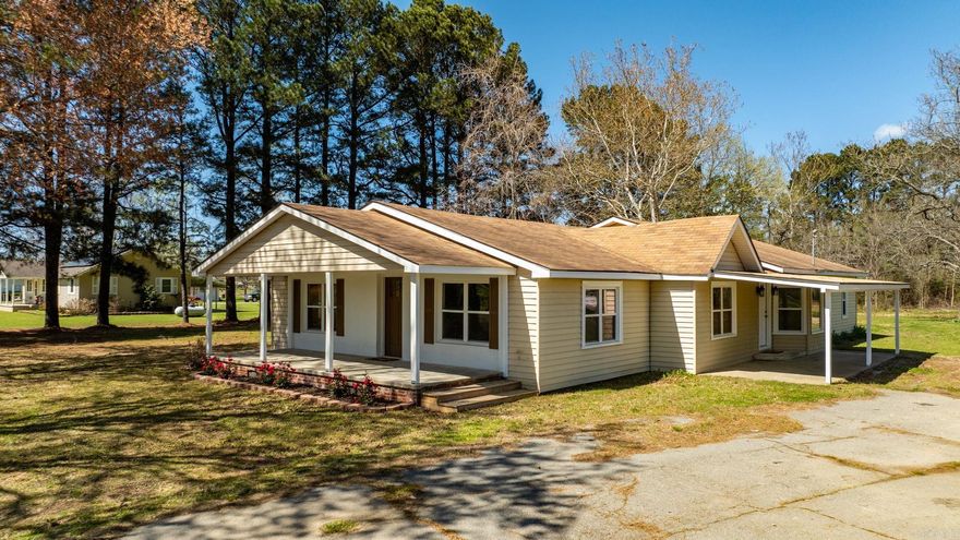 Completely remodeled home situated on nearly 2 acres, offering a like-new feel with modern updates throughout. This 4-bedroom, 3-bath home features a redesigned open floor plan with vaulted ceilings and abundant natural light. Recent improvements include new windows, HVAC system, hot water heater, sheetrock, paint, lighting, cabinetry, countertops, and appliances.  The spacious layout provides flexibility for a growing family or those needing additional room to spread out. The kitchen opens to the main living area, creating an ideal space for everyday living and entertaining.  Enjoy the peaceful setting from the front porch while taking in the surrounding nature. With extensive updates already completed, this home is move-in ready and offers the perfect combination of space, privacy, and modern finishes.