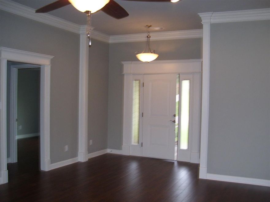 Great home in great neighborhood. No special improvement tax! 3 bed 2 bath home. All the floors are laminate, except tile in wet areas. Gas fireplace. Maple cabinets and granite in kitchen. Master has huge closet, double sinks, separate shower and jetted tub. Large deck off of back of home, great for entertaining.  Please measure for square foot accuracy. Taxes are estimated. This property eligible for Rural Development.