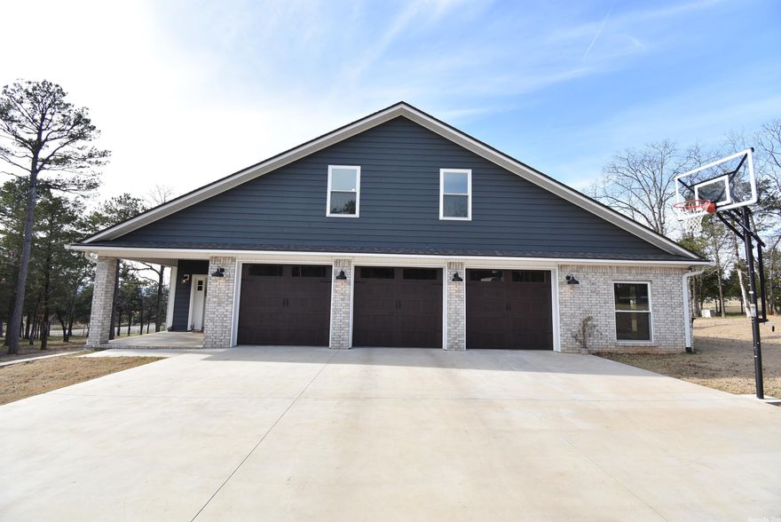 This is your lucky opportunity to own a truly unique home & peaceful property on 3.5 acres that has been thoughtfully customized for both your current & future enjoyment in mind. Enjoy not only the views of Mt. Magazine & Lake Dardanelle but the close proximity to both for wonderful fishing, hiking, & some of the most thrilling mtn. bike trails in both the state & country all just minutes away. You will also get to appreciate some of the most beautiful sunsets every day right from your large covered patio & extended open deck with pergola above. There are 5 bedrooms (master & a guest on the main level) plus an added bonus room for the family to enjoy as well as a completely private office with entry from your fully insulated 3 car garage! When it comes to your kitchen it has all the amenities & more that you would expect in a home of this caliber & value including 5 burner gas cooktop with double oven & pot filler on the backsplash, Stainless Farmhouse Sink, LG Touchscreen vent hood, cabinetry with soft close hinges & slides and a huge pantry that you'll love. Please ask your Agent for a Complete List of Amenities that go way above & beyond the standard including 1 Gig Internet!
