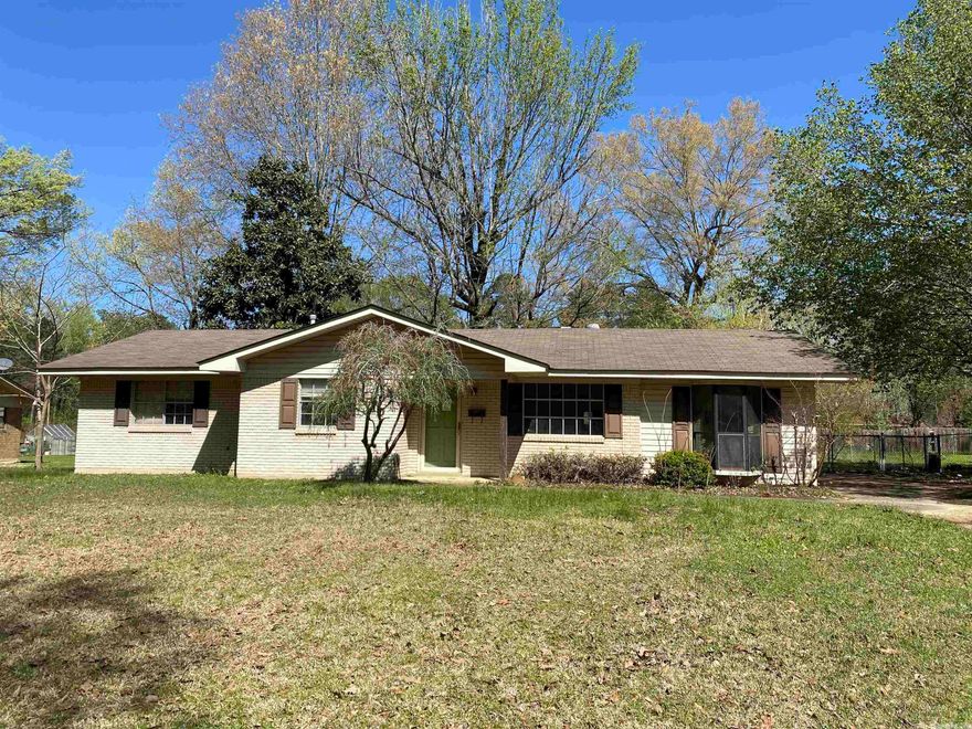 3 bedroom / 1 bath brick home with fenced-in backyard. 1,419 sqft built in 1971. Detached double carport has storage room and lean-to on back. Open living, dining, kitchen; laundry and utility rooms. Property is being sold "as-is." Refrigerator (2020), gas range w/vent hood (2020), washer and dryer remain (condition unknown). Roof approx 14 years and HVAC approx 17 years. Hot Water Heater replaced July 2023. Gas line repair July 2023. December 2023: Outside HVAC missing