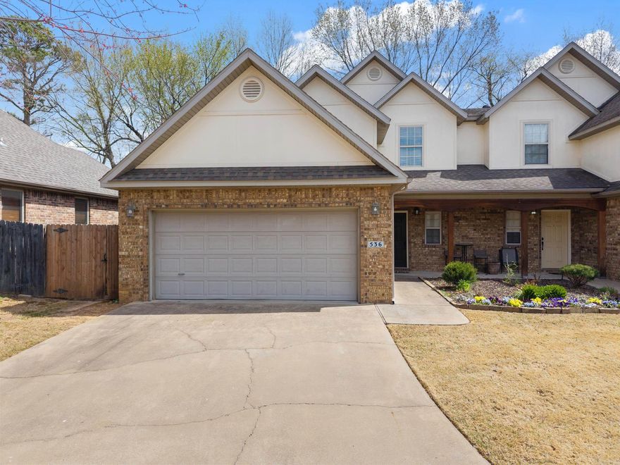 This charming two-story townhouse is situated just off South Crossover in Fayetteville, offering easy access to the University of Arkansas and downtown. It boasts 4 bedrooms, 2.5 bathrooms, a 2-car garage, a gas log fireplace, hardwood floors, and granite countertops. The fenced backyard features a patio, and the master suite includes a whirlpool tub and sellers are negotiable to selling furnishings!