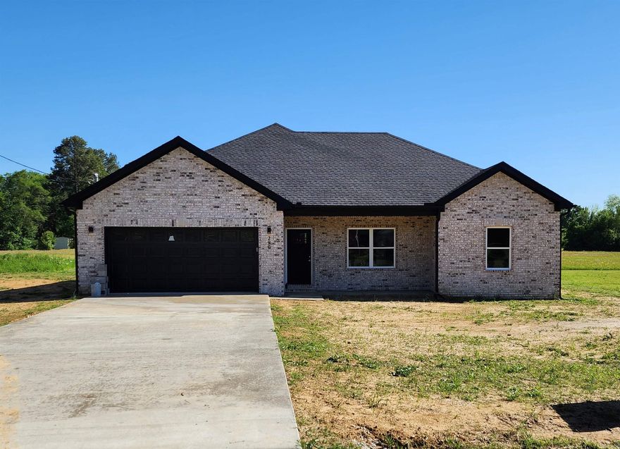 Must see this beautiful New Construction home--country feel but only minutes to interstate, shopping, and restaurants.  This beautiful home has an open floor plan and kitchen has custom cabinetry, extra large island with storage, granite counter tops, pantry, stainless steel appliances, and soft close drawers. This home offers Laundry room with storage, spacious bedrooms with walk in closets, and large bathrooms. The oversized 2 car garage is insulated and has auto opener with battery backup. Enjoy the covered back porch overlooking the large backyard to wooded areas.   Square footage is approximate, please measure.