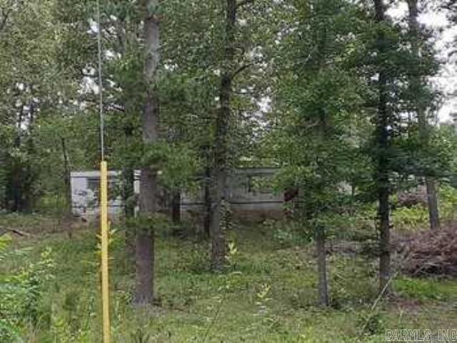 This 1.13 acre lot on Lake Barnett is the perfect place to build your retreat! There are 5 drops that have electric and water for your camper or RV, walk down to the water and fish or just sit and enjoy the outdoors, there is access to a public boat ramp to the right of the property. Perfect for a get away spot or build your home! See agent remarks.