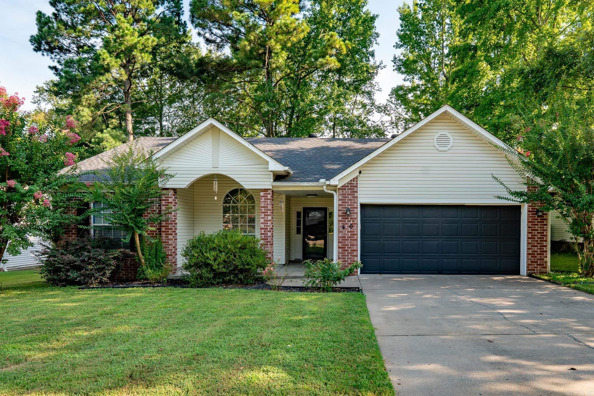 This great home in is centrally located and close and convenient to many amenities within Cabot. Once entering the front door, you will step into an inviting and spacious living room with a gas log fireplace to keep you cozy on those chilly winter days. Home has newer flooring, a few new light fixtures, counter tops have just been updated, newer paint and trim in the living room and kitchen are also newly painted. Kitchen is large with plenty of room for dinners and entertaining. Enjoy the back yard, which has beautiful shade trees and there's plenty of room for outdoor furniture on the newly added 10 1/2 x 34 patio. Roof is approximately 4 years old; HVAC is approximately 2 years old. AGENTS SEE REMARKS!
