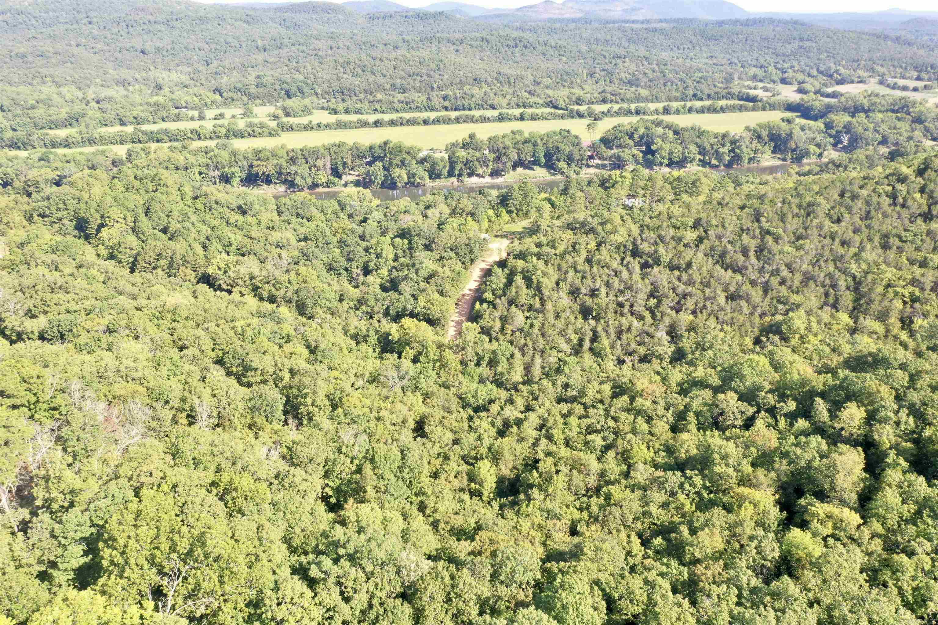 8.07 acres of wooded land near Mountain View! This beautiful property offers privacy being all wooded with No Restrictions!! Located close to the White River and downtown Mountain View! Call for more details.