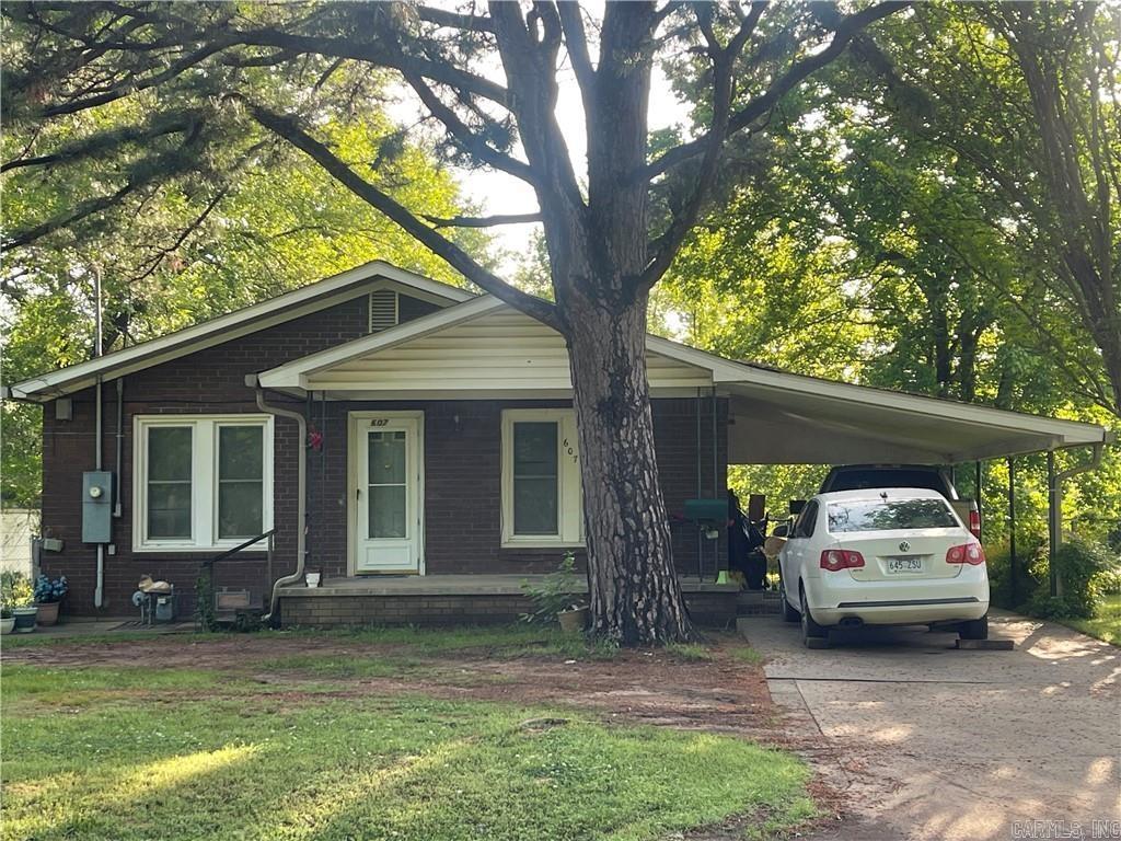 ADORABLE, BRICK Home in a great location. Large living area, formal dining room, kitchen offers plenty of cabinets with a handy laundry room nearby. Bedrooms are spacious. Hardwood flooring throughout. Within the past 5 years the improvements include: new roof, new water heater, plumbing, water lines, central heat and air. Wonderful, fenced backyard with a covered patio to relax on. Double concrete driveways on both sides of the house. See INTERNAL REMARKS.