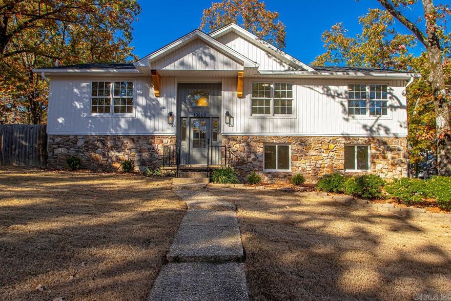 Wonderful, rare opportunity to own a fully renovated, turn-key home in the established Pleasant Valley neighborhood. This home has been completely taken down to the studs in 2025, offering the look and feel of new construction while maintaining the charm and convenience of a centrally located, mature neighborhood. This 4-bedroom, 3-bathroom home includes both upstairs and downstairs primary suites, providing excellent flexibility for various living arrangements. The layout features two spacious living areas and a fully redesigned kitchen with Taj Mahal quartz countertops, new cabinetry, and all new appliances. A large laundry room with built-ins offers potential as a hobby or craft space, and a dedicated office with its own private exterior entrance adds additional functionality. Exterior updates include architectural shingles,  siding, new gutters and screens, new exterior doors, and extensive landscaping in both front and back yards. An electric automatic gate leads to a newly added two-car carport for secure and convenient access. Outdoor living is enhanced by a new deck and full privacy fence, with plenty of yard space remaining for a future pool or sports court.