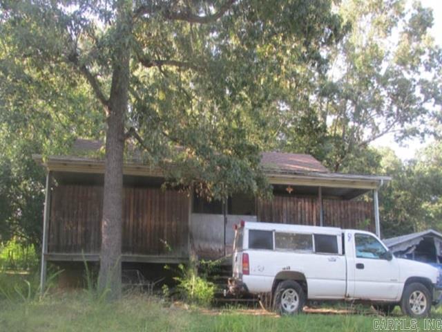 Here is your opportunity to buy the get-a-way place of your dreams! In Bull Shoals Lake neighborhood. This cabin home may need some repairs upon gaining access. 3 bedrooms, 2 bathrooms and wonderful front porch. Occupied Reserve Auction – NO ACCESS OR VIEWINGS of this property. Please DO NOT DISTURB the occupant. "As is" sale with no contingencies or inspections. Buyer will be responsible for obtaining possession of the property upon closing.