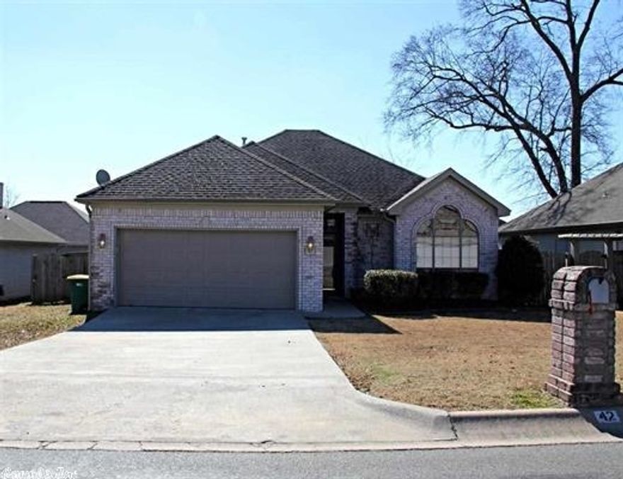 Clean as a whistle and move in ready! Split floor plan with double stack molding. Master bathroom features his/hers closets and a jetted tub. Even a hook up for a small TV Tile in the kitchen/ bathrooms. Fresh Paint. Open floor plan. Kitchen features a gas stove and a pantry. Beautiful custom back splash. Alarm system. Fully fenced, level yard with a covered patio. This house is adorable and maintained well. Show today!!