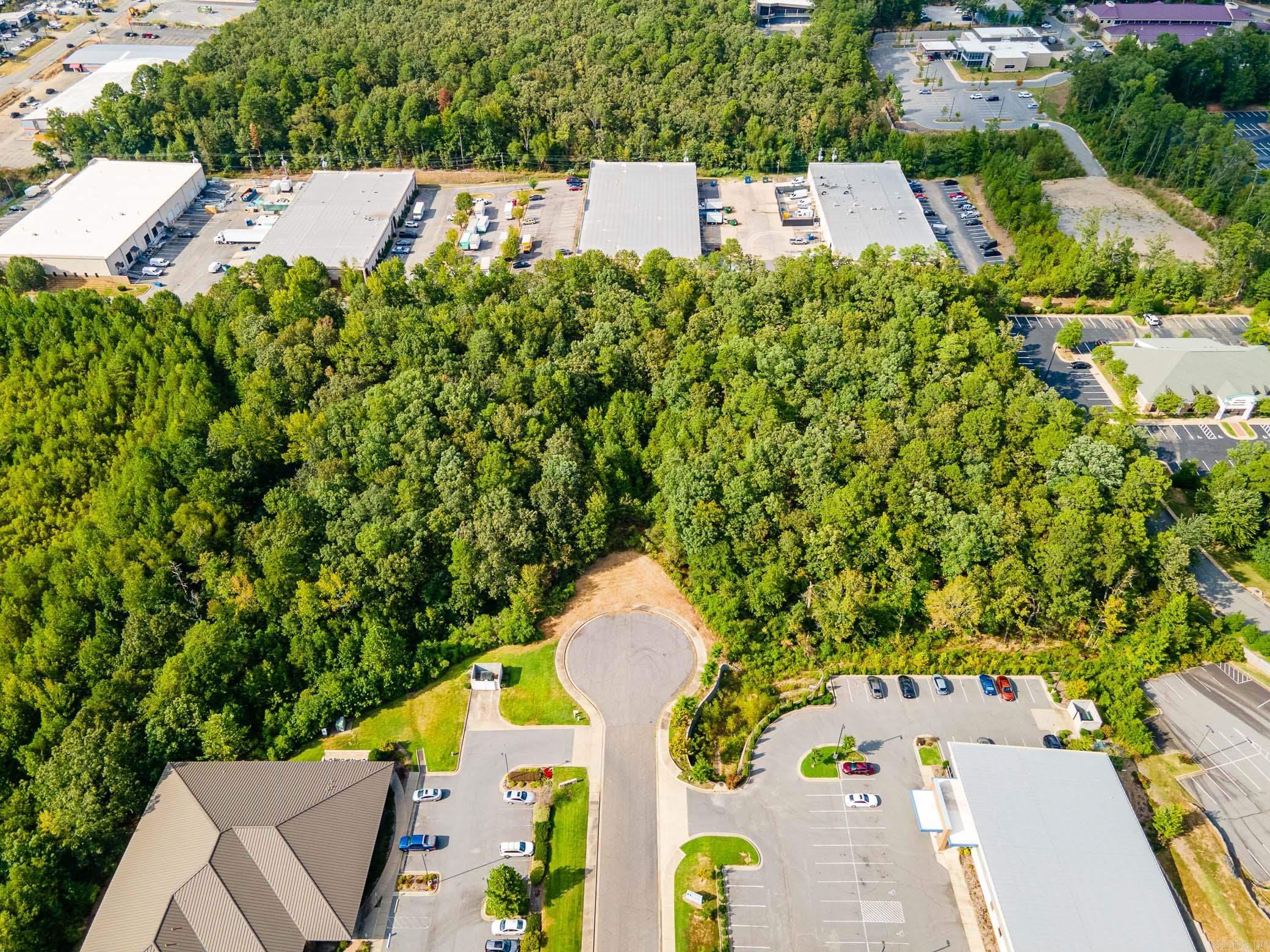 Prime location in West Little Rock. Great office space, blue prints available upon request. 5.06 Acres. Cul-de-sac off of Executive Drive.