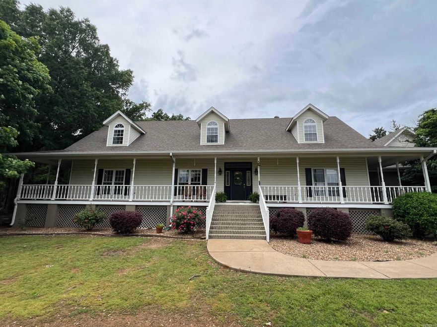 FEELS LIKE COUNTRY. CONWAY CORP UTILITIES. 3 MINUTES TO WALMART. GREAT FAMILY HOME ON 3 ACRES. VAULTED CEILING IN LIVING ROOM, LARGE MASTER BEDROOM WITH SITTING AREA, AND LARGE MASTER BATH WITH 2 WALKIN CLOSETS WITH BUILTINS. MASTER SUITE DOWN, 3 BEDROOMS 2 BATHS UP. JACK & JILL BATH, AND BONUS ROOM, SPACIOUS KITCHEN, DOUBLE OVEN. OVERSIZED PANTRY CABINET. EXTRA LARGE CLOSETS THROUGHOUT THE HOUSE, INGROUND SALT WATER POOL, OUTDOOR KITCHEN, BUILT IN GRILL, TV. 3 CAR ATTACHED GARAGE. ONE CAR DETACHED GARAGE/SHOP WITH 220, HEATED AND COOLED NOT IN SQ FT. WOODBURNING FIREPLACE. PRIVATE BACK YARD, UNABSTRUCTED VIEWS OUT FRONT.
