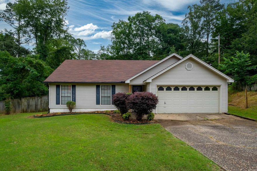 Welcome to your charming home nestled on a cul-de-sac convenient to everything West Little Rock has to offer! Step inside to discover a large family room adorned with a vaulted ceiling which opens up to the dining room and kitchen. The primary suite features an ensuite bathroom, complete with a tub and shower and a convenient walk-in closet, providing ample storage space for your wardrobe essentials. Large, private backyard. New paint throughout! Agents, see remarks.