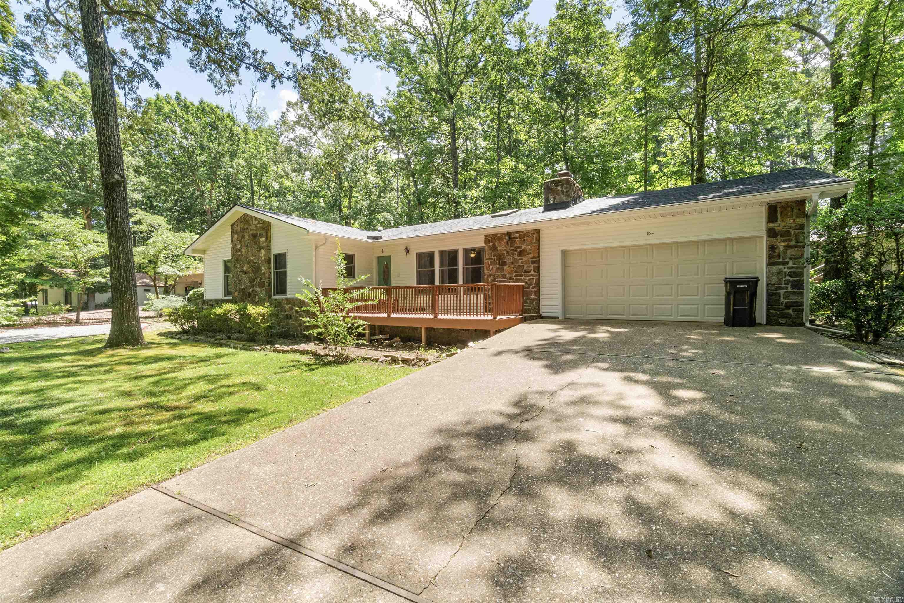 Welcome to your dream home nestled in the picturesque DeSoto golf course neighborhood! This one level 3 Bedroom - 2 - Bath home sits on a level corner lot and is move in ready. Features include an Arkansas room, wood burning fireplace, 2 car garage, no carpet, and New Roof June 2025. Roomy Kitchen offering plenty of cabinet/counter space, pantry, newer refrigerator, and dishwasher. Spacious bedrooms with tub/shower combo in the guest bath and walk in shower in the master bath. Located within minutes from the West Gate, Desoto Club, Desoto Outdoor Pool, and Pickleball Courts! Schedule your showing today! One-time POA buy-in fee $2000 due at closing.
