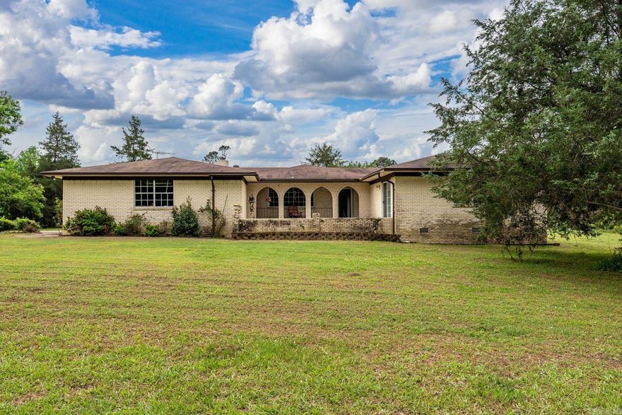 Welcome to this spacious 3-bedroom, 2-bath home offering approximately 2,426 square feet of comfortable living space, situated on 2 acres. This well-maintained property provides a great blend of functionality and flexibility, with generous living areas suited for everyday living as well as entertaining.  The home features a practical layout with ample room to spread out, while the surrounding acreage offers a peaceful setting and plenty of usable outdoor space. An oversized shop provides excellent space for projects, hobbies, or additional storage, and multiple outbuildings add even more versatility to fit a variety of needs.    Whether you're looking for room to expand, space for outdoor activities, or simply a more private setting, this property offers a wide range of possibilities.