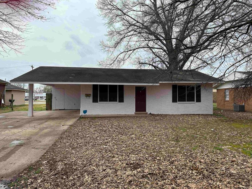 This brick home was recently painted and has two bedrooms and 1 bath. Tile and wood look flooring, eat-in kitchen, separate laundry room, privacy fence and carport.