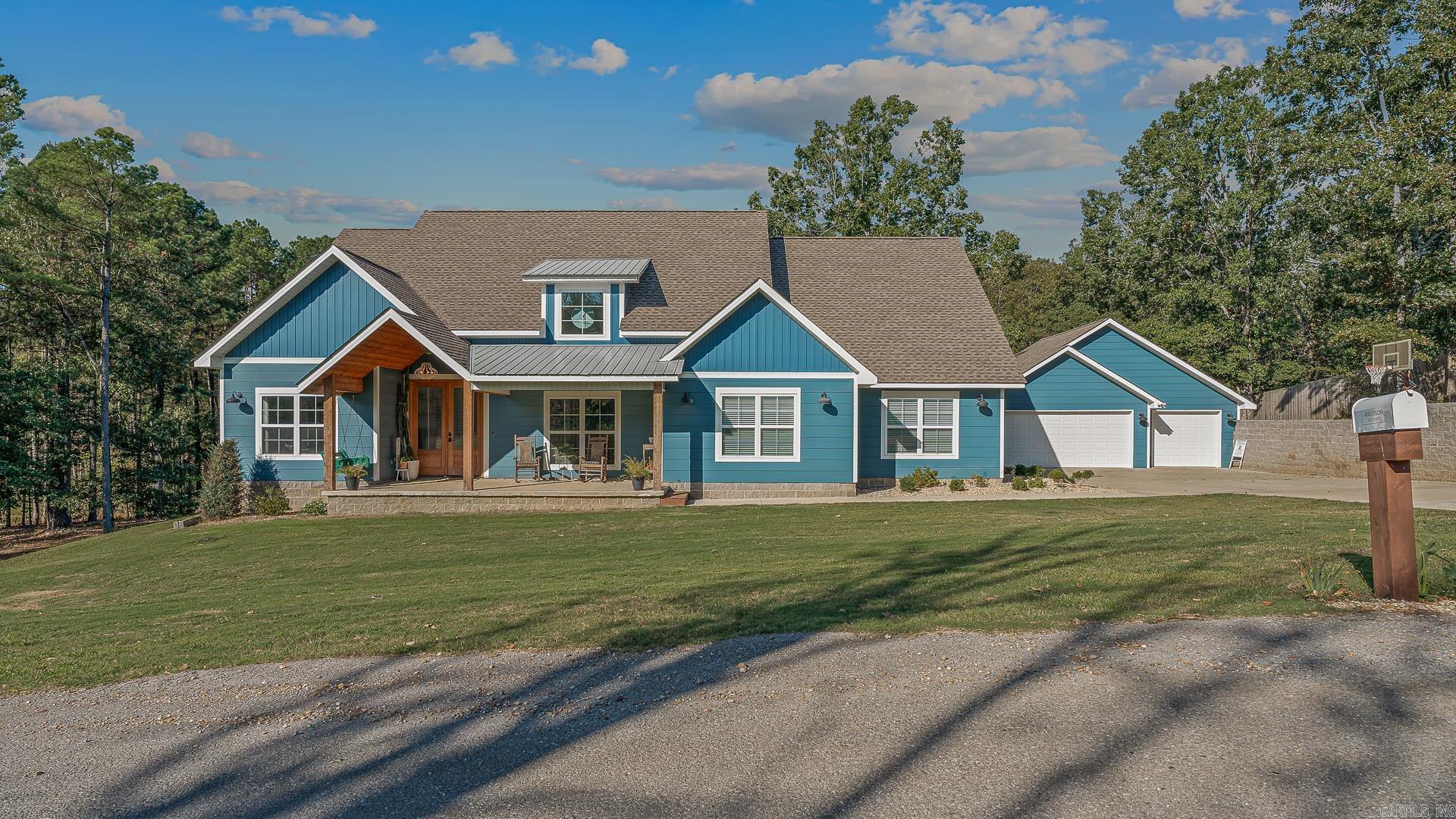 Step into your dream home, situated on a beautiful 3 acre lot offering the perfect country lifestyle with the convenience of being about 5 minutes from town for easy access to shopping and dining. This 4-bedroom, 2.5-bathroom home features approximately 3,157 square feet of thoughtfully designed living space, including a versatile bonus room, 2-car garage, and SHOP for all your projects and storage needs. Step outside to enjoy a charming front porch, spacious back deck, and expansive backyard that provides limitless opportunities for recreation and relaxation. Located in the highly regarded Valley View School District, families will appreciate the quality educational opportunities. This exceptional property offers the space, privacy, and lifestyle that's increasingly rare to find, delivering the perfect balance of country living and modern convenience.