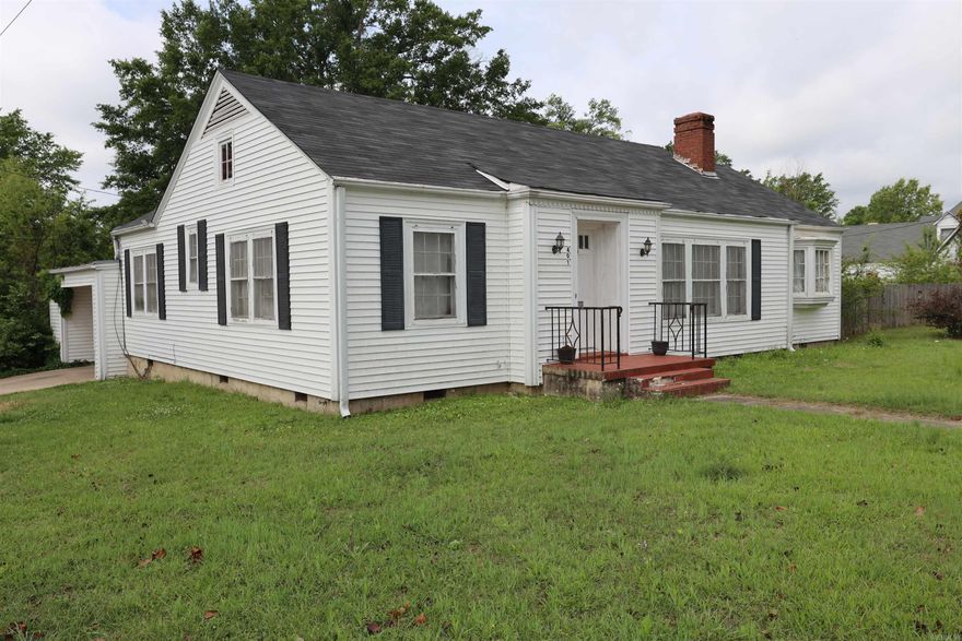 Charming 3 bedroom, 2 bathroom home located at 401 W4th Street in the heart of Fordyce. This well maintained property offers 1,487 sq ft of comfortable living space, featuring a spacious living room perfect for relaxing or entertaining.  The home includes durable vinyl siding for low maintenance and a covered carport with a convenient two door storage room, providing plenty of extra space for tools or equipment.  Step outside to enjoy the large backyard, ideal for gatherings, pets, or future improvements.