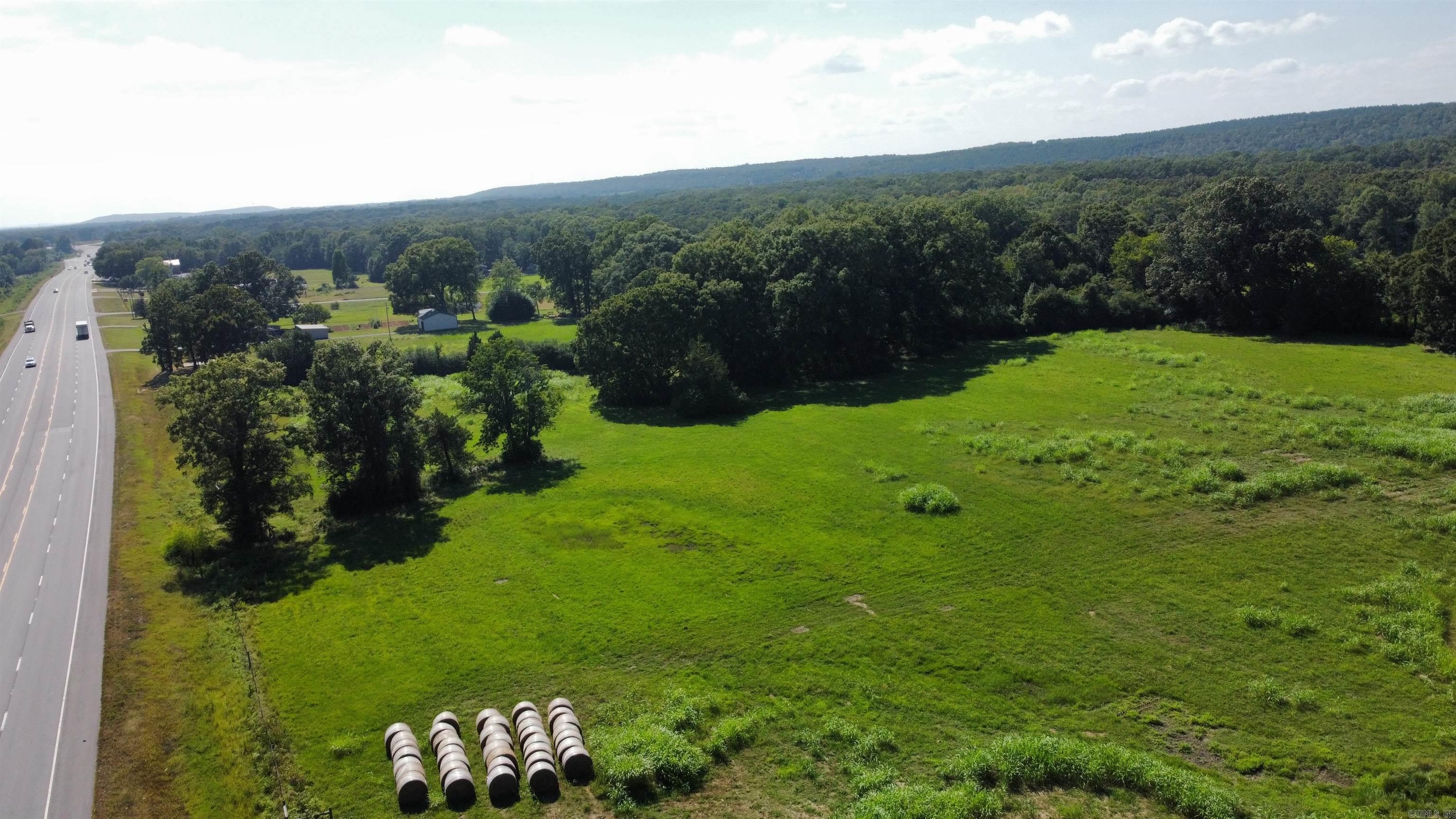 Don’t miss this rare opportunity to own 4.02 acres of open pasture land with prime highway frontage! Located in Vilonia, this unrestricted and undeveloped property offers endless possibilities. Whether you're looking to build, develop, or invest this property offers maximum flexibility in Faulkner County.