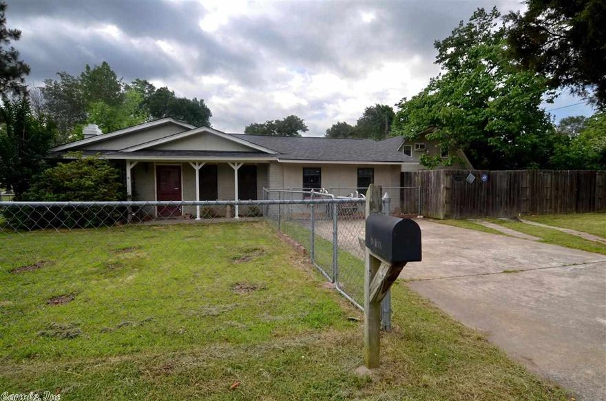 Updated home with enclosed garage (included in sq footage) that can be used as a bonus room, shop, man cave, or in-law quarters.  There is an additional full bathroom upstairs that can easily be finished.  It has a private backyard with an in-ground pool.  Call to see it today!