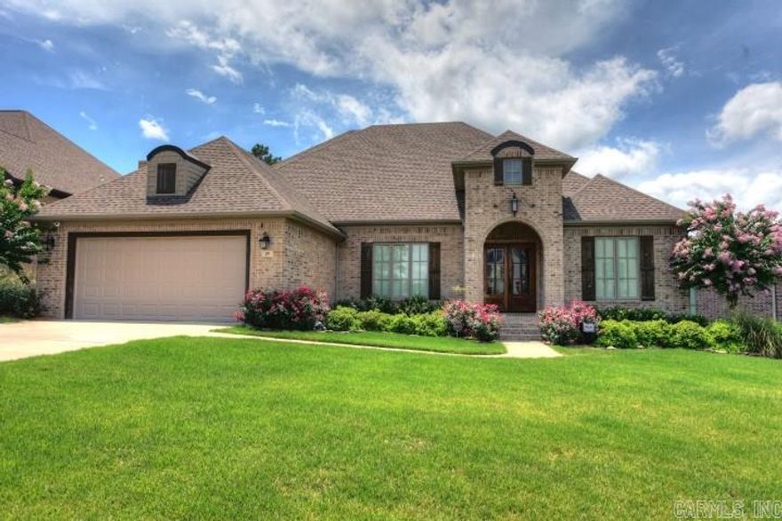 Beautifully detailed home in coveted neighborhood!  Mostly one level living with bonus and full bath upstairs.    Lots of trim detail and extra special touches throughout.   FABULOUS kitchen with huge center island has built in book shelves.  Tons of cabinet space and walk in pantry.  Stunning master bath and amazing closet which accesses the laundry area.  Separate office and formal dining with butler's pantry. You'll love the covered deck which overlooks greenspace.  DON'T MISS THIS.  AGENTS: SEE REMARKS