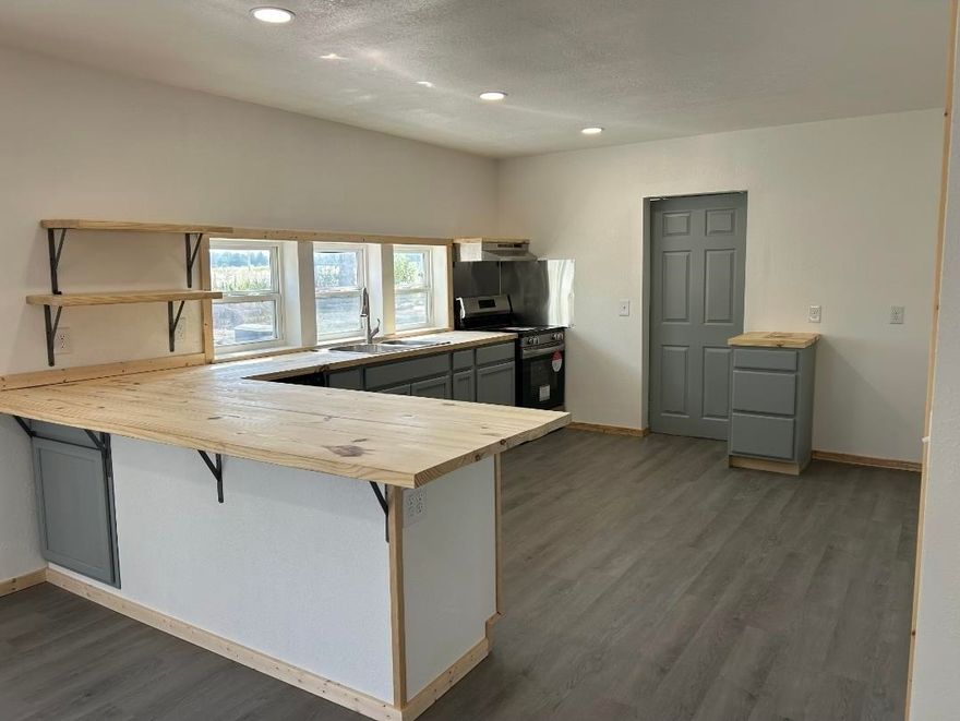 This Hobby Farm is up for grabs! Enjoy 9 Acres of peaceful bliss located a mile down a dirt road, with a touch of modern and chic. With a pond, chicken coop, outbuildings, and a privacy fenced yard, this home is an oasis for country lovers. This home is a 4 Bedroom/2 Bath house that has been fully remodeled for your relaxation and comfort. This home also has new HVAC and a new roof. Put your roots down and become the proud owner of a mini farm today! Updates still being made, but will be finished soon.