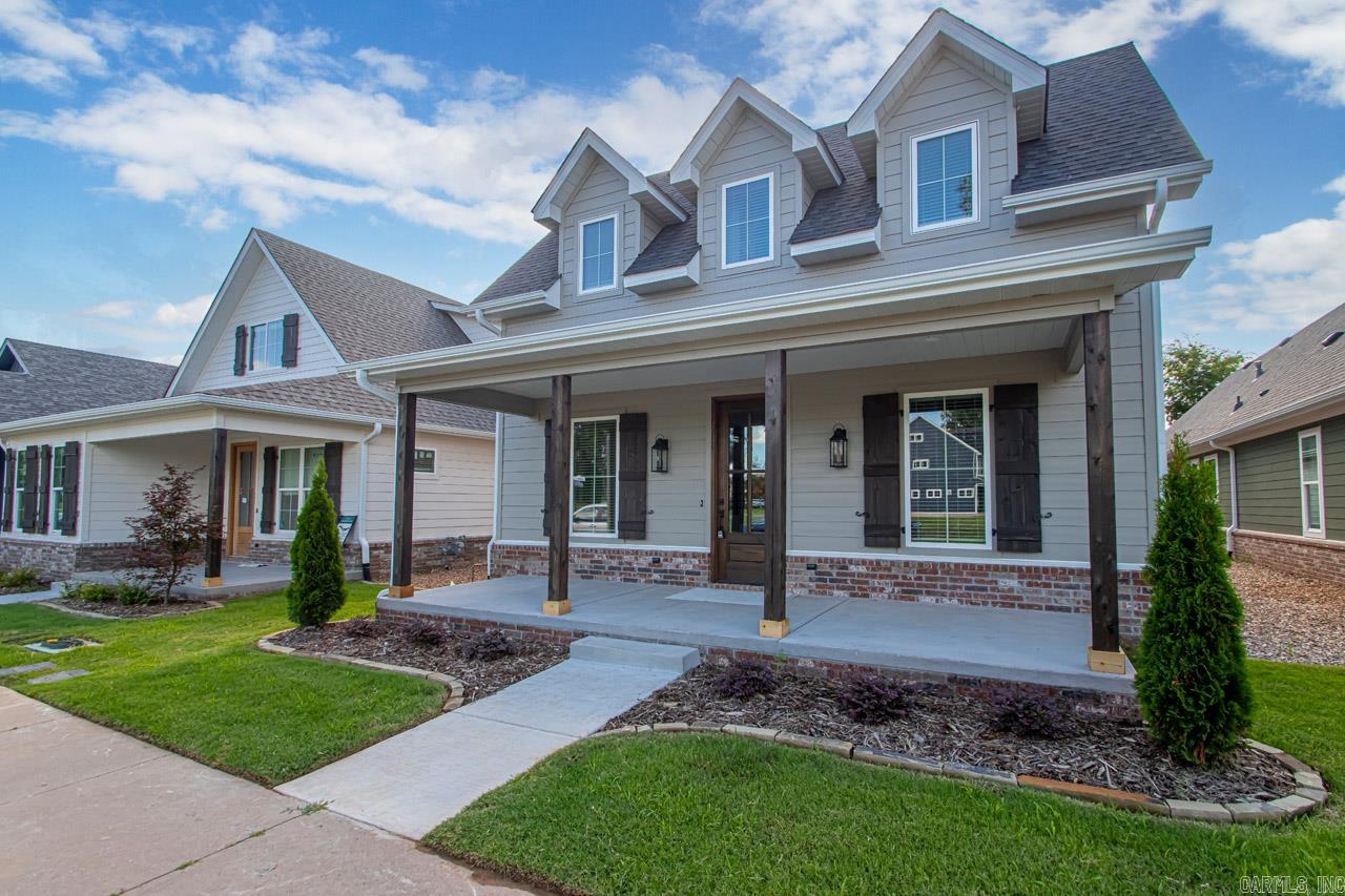 Move-in Ready. Rockwater Village - New Construction Charleston Style Home with 2,450 sqft heated and cooled and 3,240 sqft under roof, 3 bedroom, 2 1/2 bathroom, 2 car garage. Features custom cabinets, solid surface countertops, stainless appliances, gas cook-top, wall oven, built-in microwave, pantry cabinets, vented gas log fireplaces, tiled master shower with upgraded energy efficient packages that include Foam insulation in the exterior walls and cellulose insulation in Attics. Optional: 100% Financing for qualified buyers thru Regions Affordable 100 Program.
