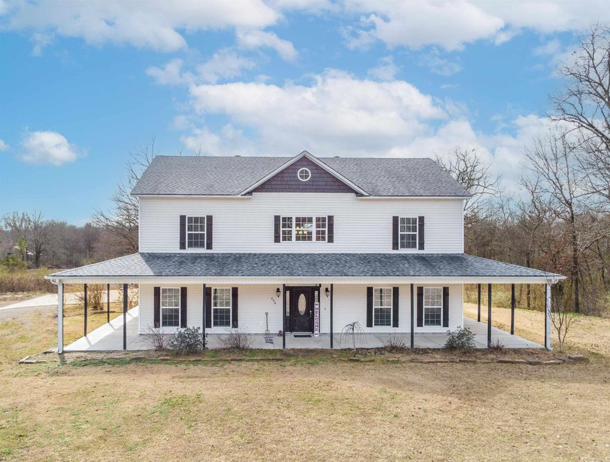 Beautiful 2-story home nestled among 3 acres in the country! Wrap around porch on 3 sides. Spacious living room with huge gas log fireplace. Nice size kitchen features granite countertops, double oven, pantry and a brand new dishwasher! Formal dining room with built-in China cabinet. Large primary suite has it's own full bath including a soaking tub, double vanities, and a custom tile shower. Upstairs is 3 bedrooms, a bonus room and a full bath. Outdoor entertainment area has a covered back porch and a 18'x33' above ground pool surrounded by composite decking! Pool liner was replaced in 2023. 24 hour notice please!