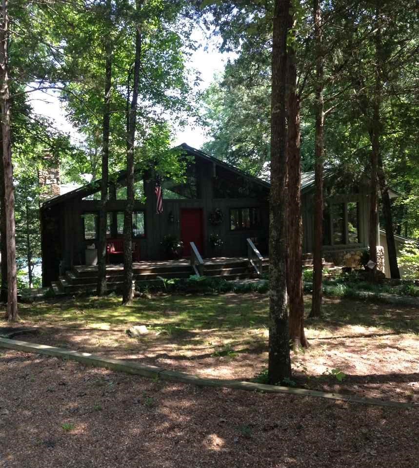 Great home with 2 slips (one has boat lift) in a 6 stall community dock. New Roof 2013, new deck 2013, up-dated kitchen (Granite) 2013. Furniture conveys with good offer. $400.00 a year for dock maintenance..
