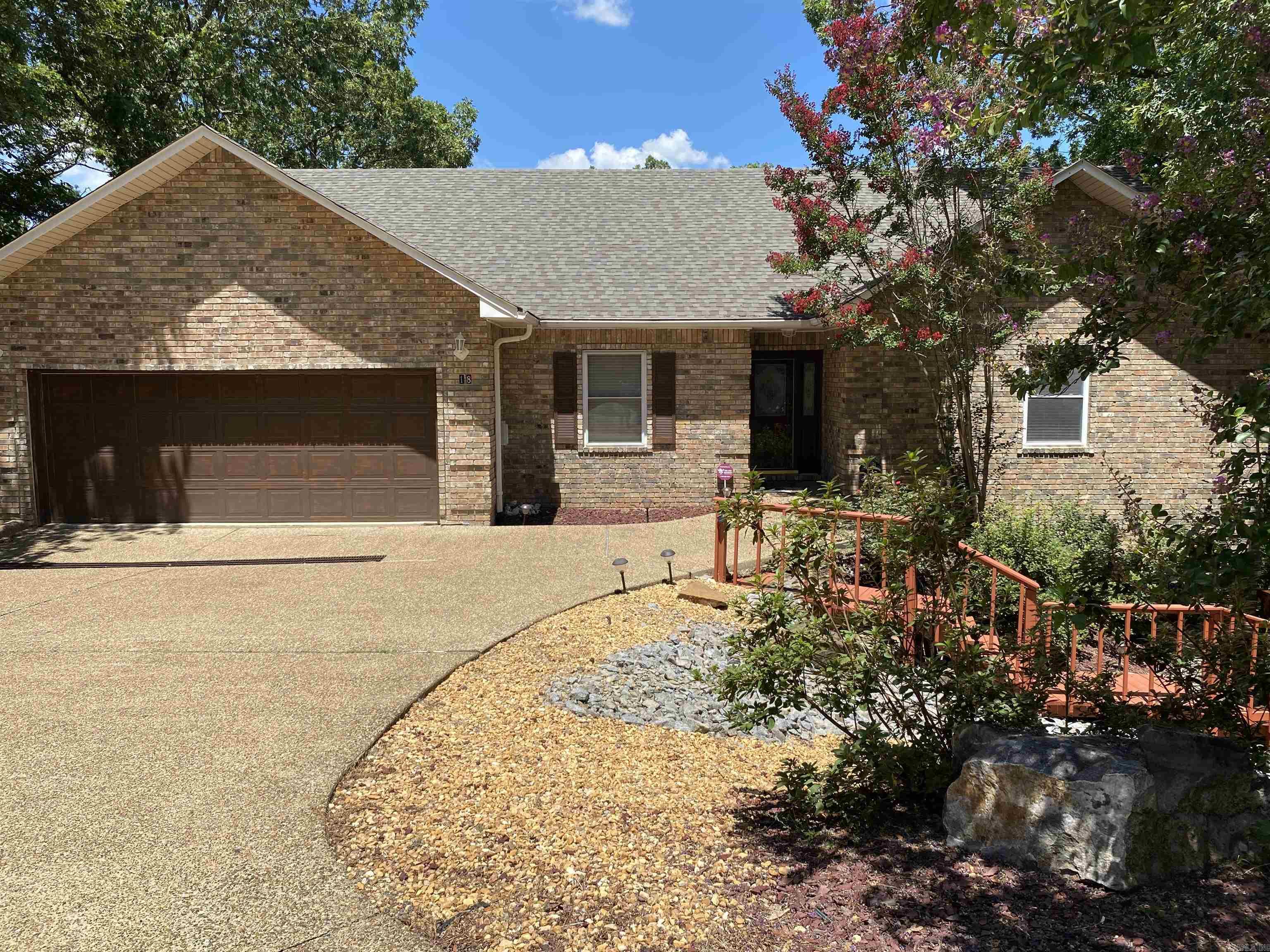 Two homes in one. Absolutely beautiful all-electric home w/two living spaces w/a separate entrance nestled in the countryside of HSV overlooking Lake DeSoto and great mountain views. The rear of the homes has two lighted decks that stretch the full length of the home for spectacular views all year round. Kitchen has beautiful naked cabinets. Granite counter-tops & backsplash are the same. Name brand appliances, cabinets w/pull outs. Granite face FP w/wood frame. Cabinets galore w/sink in laundry rm. Off LR is MBR and two nice size bedrooms. MBR has sliding doors to deck; extra large MBR bthrm and WIC. The lower level can be used as in-laws quarters, expanded living space for visiting family members or rental. Lower level has sep entrance, entire apt w/WIC, inside storage space, w/full bath. Beautiful LVP flooring throughout, tile in bathrooms. Safe room on lower level. Fenced backyard. Lots of amenities that will fit your every need. Move in ready. Call today for your personal showing. 2HVAC units. New roof 2025.