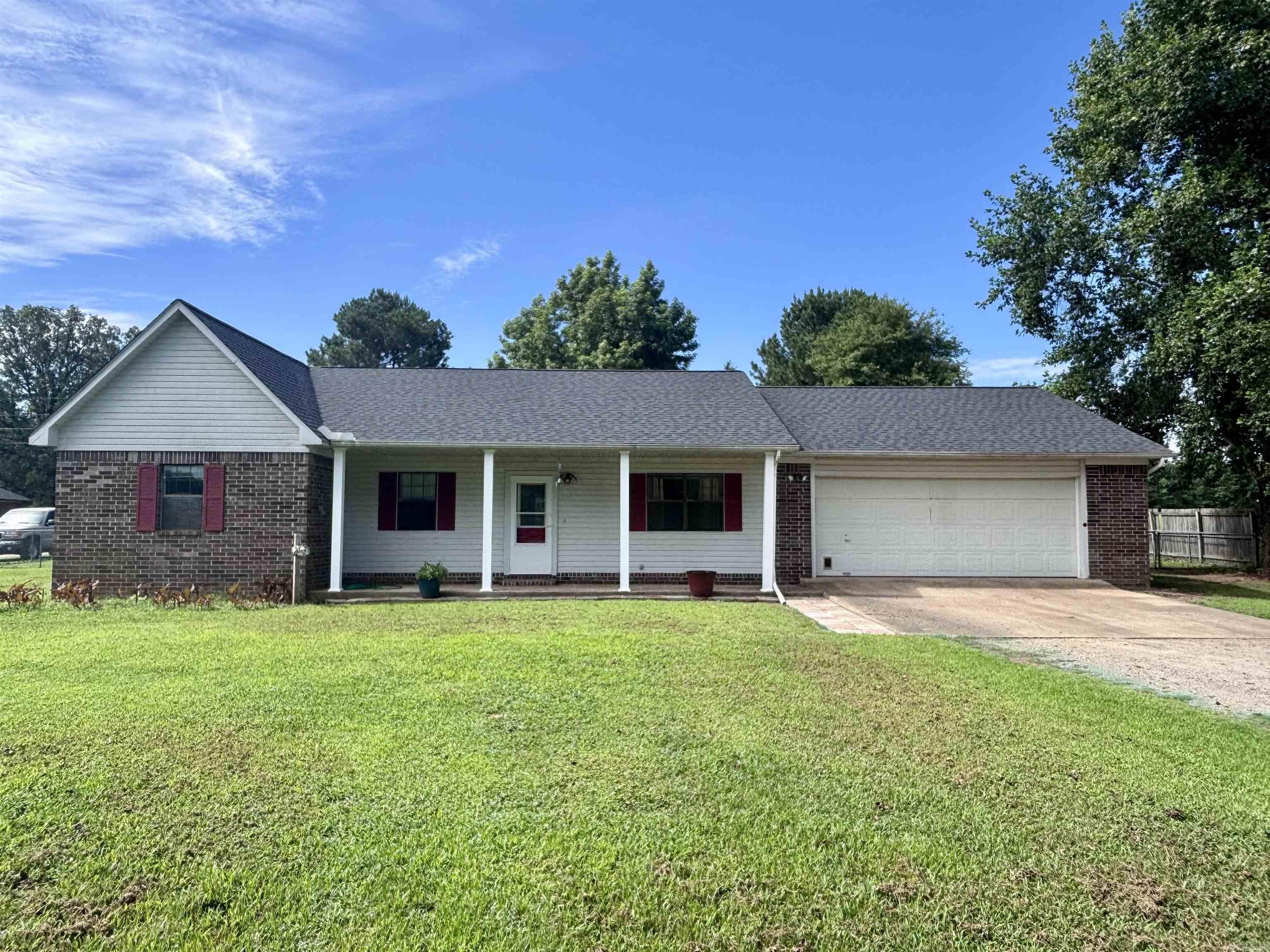 Welcome to this spacious and maintained 3-bedroom, 2-bath brick home offering almost 1800 square feet of comfortable living space. Suited on a generous lot, this home features a 2-car garage and a workshop out back that is perfect for hobbies, storage or your next big project. Inside, you will find plenty of storage space throughout, spacious living areas and a functional layout that is perfect for families. Washing machine, dryer and refrigerator convey!! The brick adds curb appeal and low maintenance! Call today!!