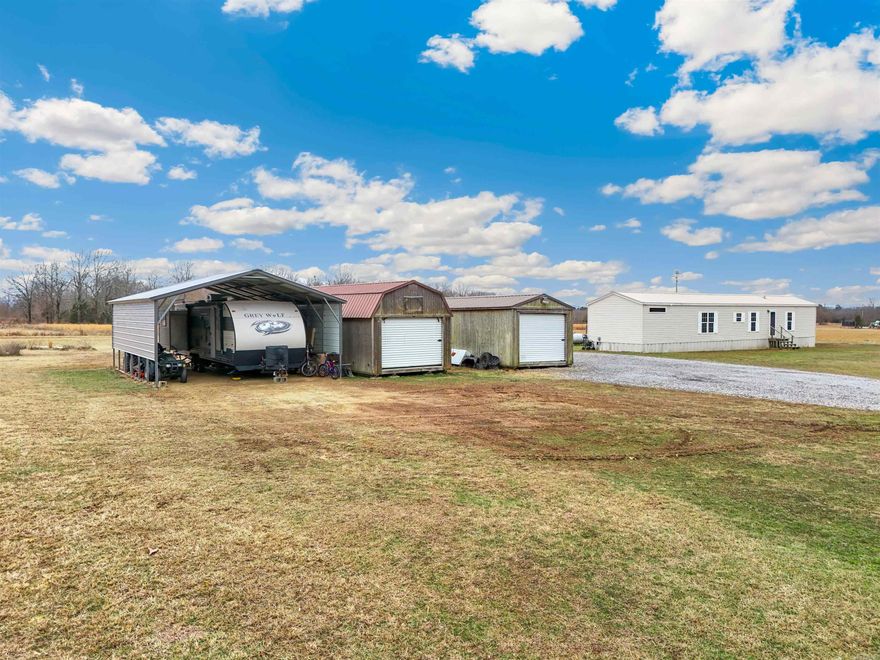Enjoy peaceful country living with this mobile home situated on 6.21 +/- acres of open pastureland. This property offers space, and endless possibilities. Perfect for livestock, gardening or future expansion. A great opportunity for those seeking land and affordability all in one package. Zero Restrictions. Agents see remarks for showing info.