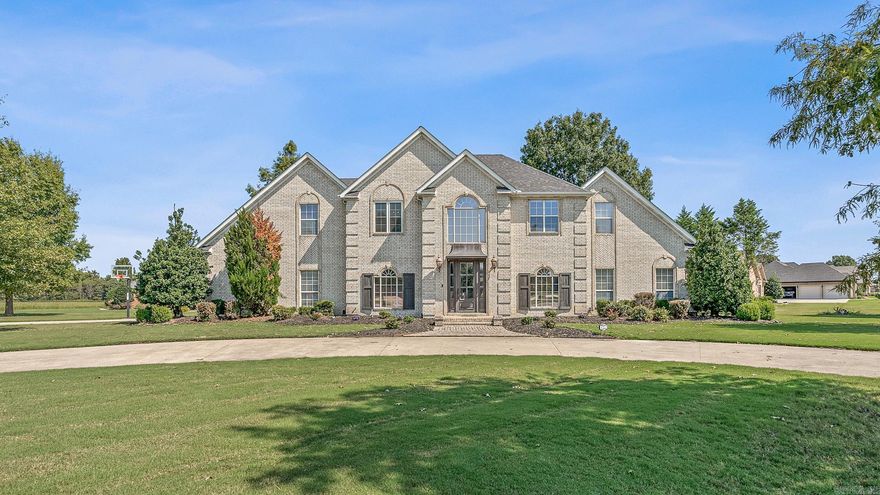 Discover the perfect blend of comfort and elegance in this stunning all-brick, two-story home nestled on 0.67 acres. Thoughtfully updated throughout, this home offers space and versatility with an upstairs bonus room that can easily serve as a theater or a 5th bedroom.  The second floor boasts three generously sized bedrooms and two full baths, while the main floor offers a luxurious master suite complete with a spa-like bath, double granite vanities, a spacious tub, separate shower, and a walk-in closet.  Step into the beautifully updated kitchen featuring sleek white cabinetry and granite countertops. With new flooring in most of the home, every room feels fresh and inviting. The expansive, fully fenced backyard is perfect for outdoor living and entertaining.  To top it all off, the convenient circle driveway enhances the appeal of this corner-lot gem, making it as welcoming as it is impressive.