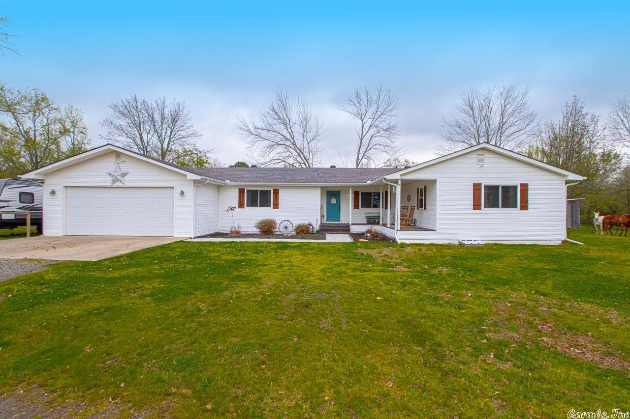 Don't Miss This One !!! Updated Farmhouse on a little over 3 acres with room for your horses. Beautiful three acres completely fenced and ready for your horses or cattle. Inside you will find an open floor plan with New LVP flooring, good size rooms, pantry, separate laundry room, walk in closets and MORE. New paint throughout and beautiful accent wall in the living room and Master Suite. Call me to schedule your showing. AGENTS - Please see AGENT REMARKS