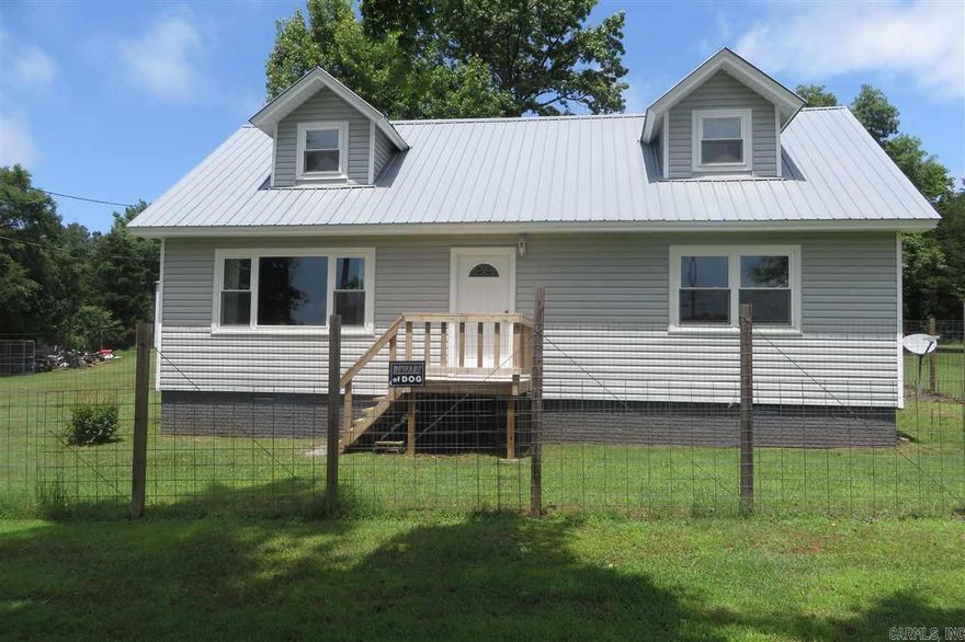 Metal Roof, No Maintenance, Vinyl Siding, New Energy Efficient Windows, Freshly painted, New carpet and Laminate flooring. 40 x 60 Shop complete with 10,000 lb Rotary Car lift, Two 15 ft Doors, solid thick concrete floors wired for both welders and air. All Quietly nestled on almost 3 surveyed acres on Crow Mtn. Cars Enthusiasts, Body workers, Truckers or that much needed Bass Boat and Golf cart storage, Please Don't Miss This One! $129,900