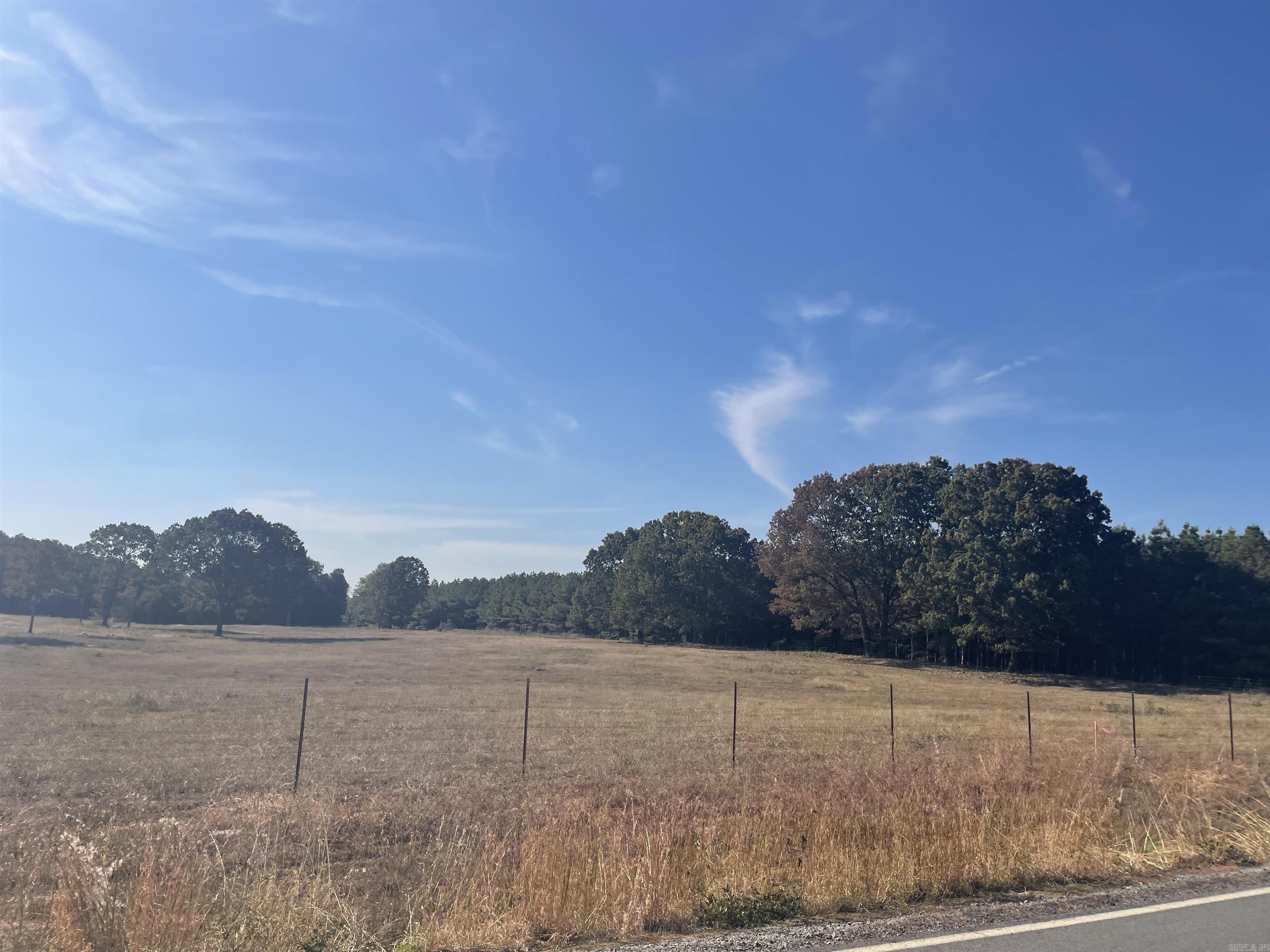 This peaceful 3 acre lot is perfect to build your dream home with plenty of privacy and frontage on Grandview road. Water and electric at road. No mobiles/1300 sq foot min.