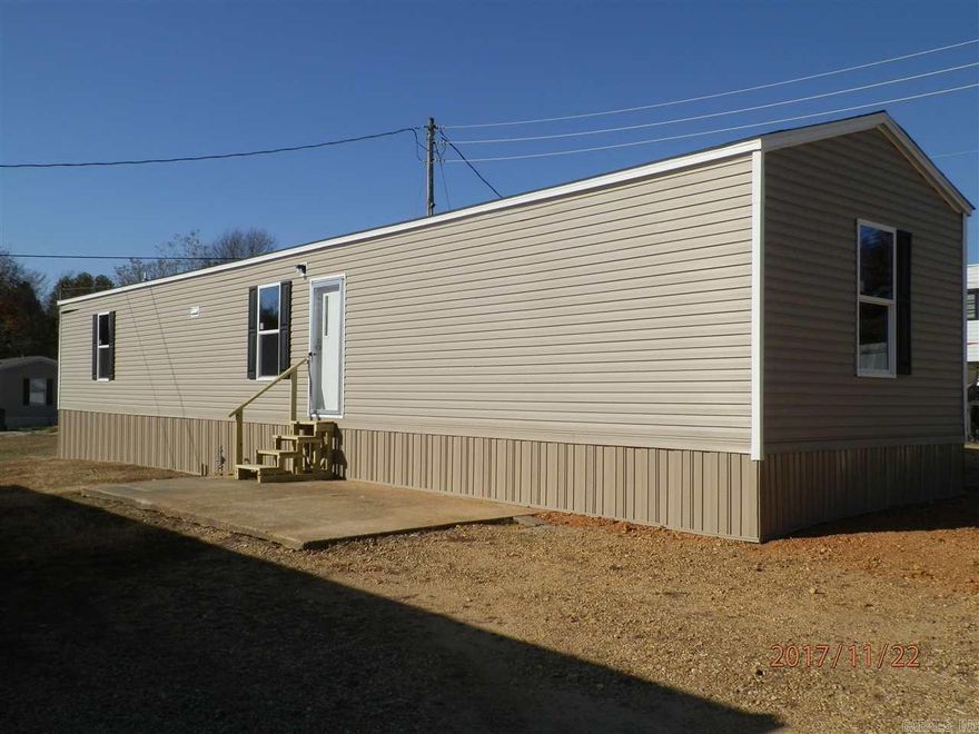 This new mobile home with split floor plan has an open living/kitchen/dining area. Appliance furnished are electric stove, refrigerator and dishwasher. No pets. Rent includes water usage and lawn care. Tenant pays all other utilities. Interested persons must apply and pay application fee with Listing Office.