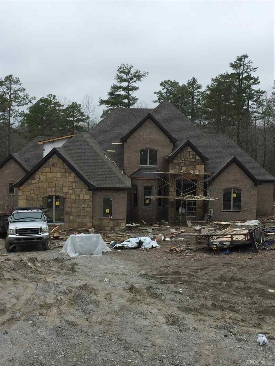 Stunning custom home in the premier gated neighborhood of Westcliffe. Impressive staircase leads up to the second story where you will find 2 bedrooms, bathroom, and large living/play room. Downstairs is a formal dining, office, hearth room, living room, and spacious kitchen. The master is oversized with a luxurious master bath with walk in custom tile shower. Also downstairs you will find an additional master suite. Cul de sac location with gorgeous views, wooded yard, and view of pond and wildlife.