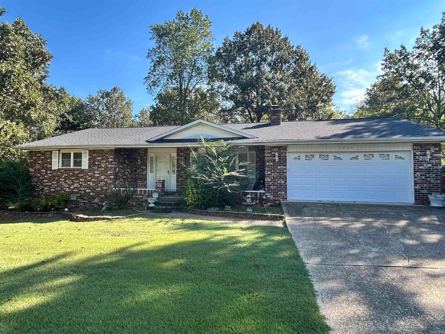 Great home sitting on just over 1/2 an acre, it includes a 448 sq. ft. heated and cooled sunroom, a 36x30 (1150 sq. ft.) insulated shop with its own HVAC system, the home is very roomy, with a nice gas log fireplace, and a great back porch for sitting and drinking coffee in the morning. Nestled in a quiet neighborhood in the mountains, this home is in great condition and currently livable, with some fresh paint and new floors this home would be the perfect family home.  Generator and shed will convey with a full price offer.