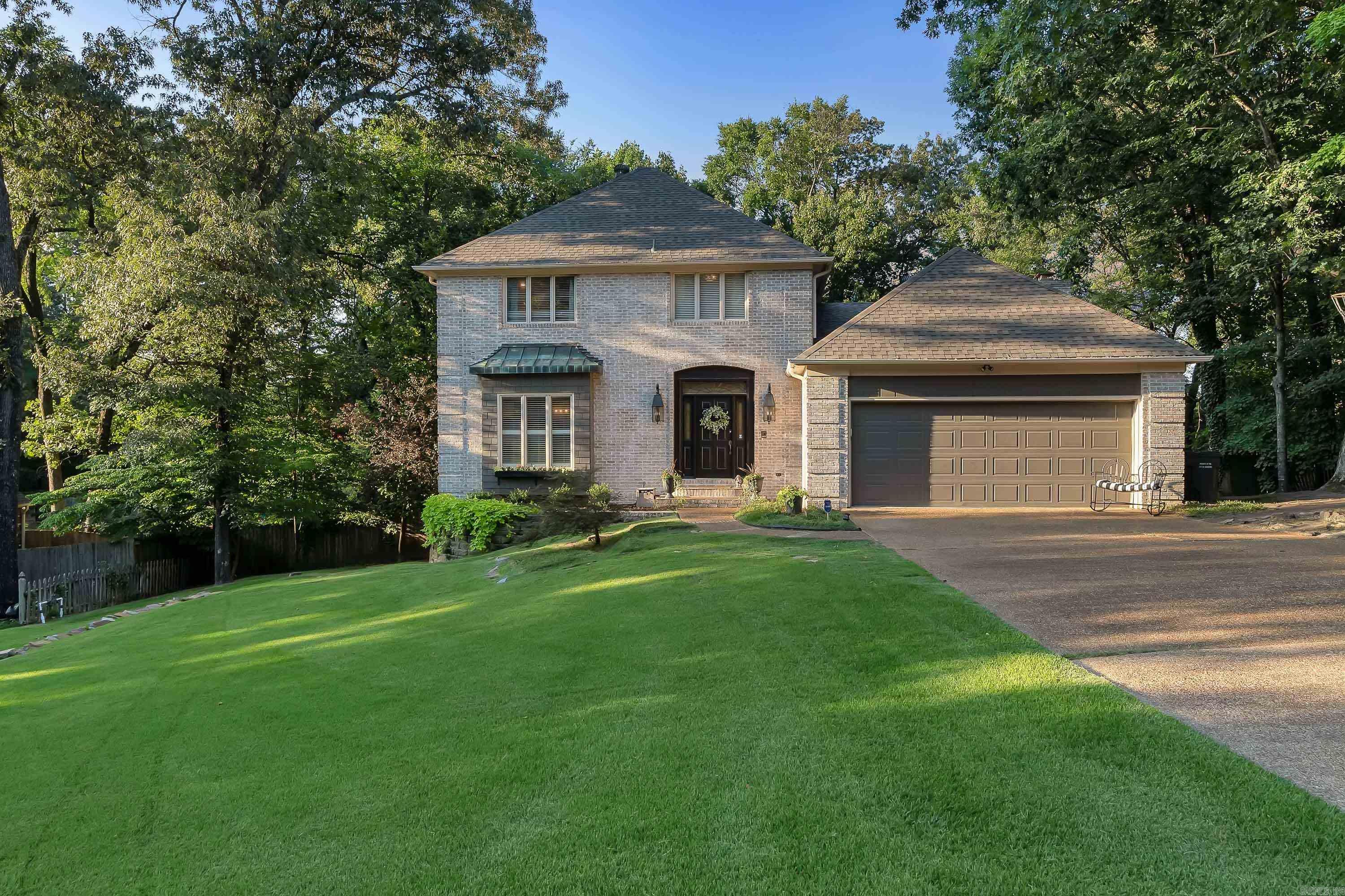 Welcome to this spacious tri-level home nestled in the desirable Rosewood Estates, sitting on approximately 55 hundredths of an acre +/-. Designed for both comfort and entertaining, this home offers the perfect blend of style and functionality. Step outside to indulge yourself on the screened-in porch or unwind on the patio, all while overlooking a lush lawn framed by outstanding landscapingāa private retreat ideal for gatherings with family and friends. Inside, youāll find 4 bedrooms and 3.5 baths thoughtfully arranged across the levels. The main living area boasts a cozy fireplace, hardwood flooring, and elegant shutters that add warmth and charm. The chefās kitchen is sure to impress with its island, double ovens, stainless steel appliances, and ample space for cooking and entertaining. The primary suite features a beautifully tiled shower, offering a spa-like escape. With its inviting spaces and attention to detail, this home is move-in ready and waiting for its next chapter. Call or text today to schedule your private tour of this awesome home!