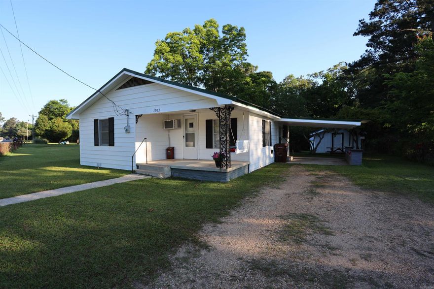 Charming 3 - bedroom, 1 - bath home situated on a spacious 0.7 acres lot in a great location! This 1,059 sq. ft. home offers plenty of outdoor space with 3 outbuildings, a partially fenced yard, and is conveniently located less than 1/2 mile from Bradley County Park Road. Recent updates include an 11 year old metal roof, new vinyl plank flooring, new A/C and heat window unit, new exterior doors, plus many fresh touch-ups and additional improvements throughout the home. Whether you're looking for a starter home, investment property, or a place with extra storage and room to grow, this property has great potential!