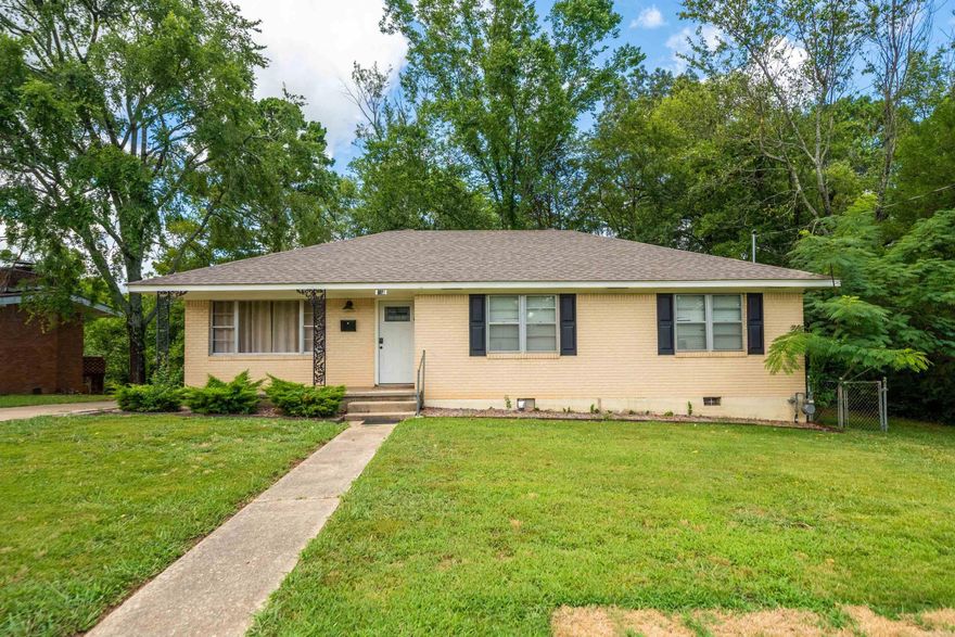 This fully-furnished brick cottage is located in the heart of Hot Springs, just One mile from Oaklawn racing. Currently an income-producing nightly rental, this city home is selling turnkey - with all appliances and furnishings conveying. You'll love the updated and well-kept interior featuring 3 beds and 1.5 baths with original hardwood floors, a covered back deck, brick construction and a recent roof. The fully fenced back yard offers a peaceful and private space for loved ones and pets alike. Completing the package is a detached one-car garage, offering convenience and additional storage options. Situated in a quaint neighborhood, this property offers a unique sense of community and a friendly atmosphere. Let this house be the newest addition to your investment portfolio, or your new place to call "home".  See MLS #: 24026133 for the complete investment package which includes 3 short-term-rental properties.