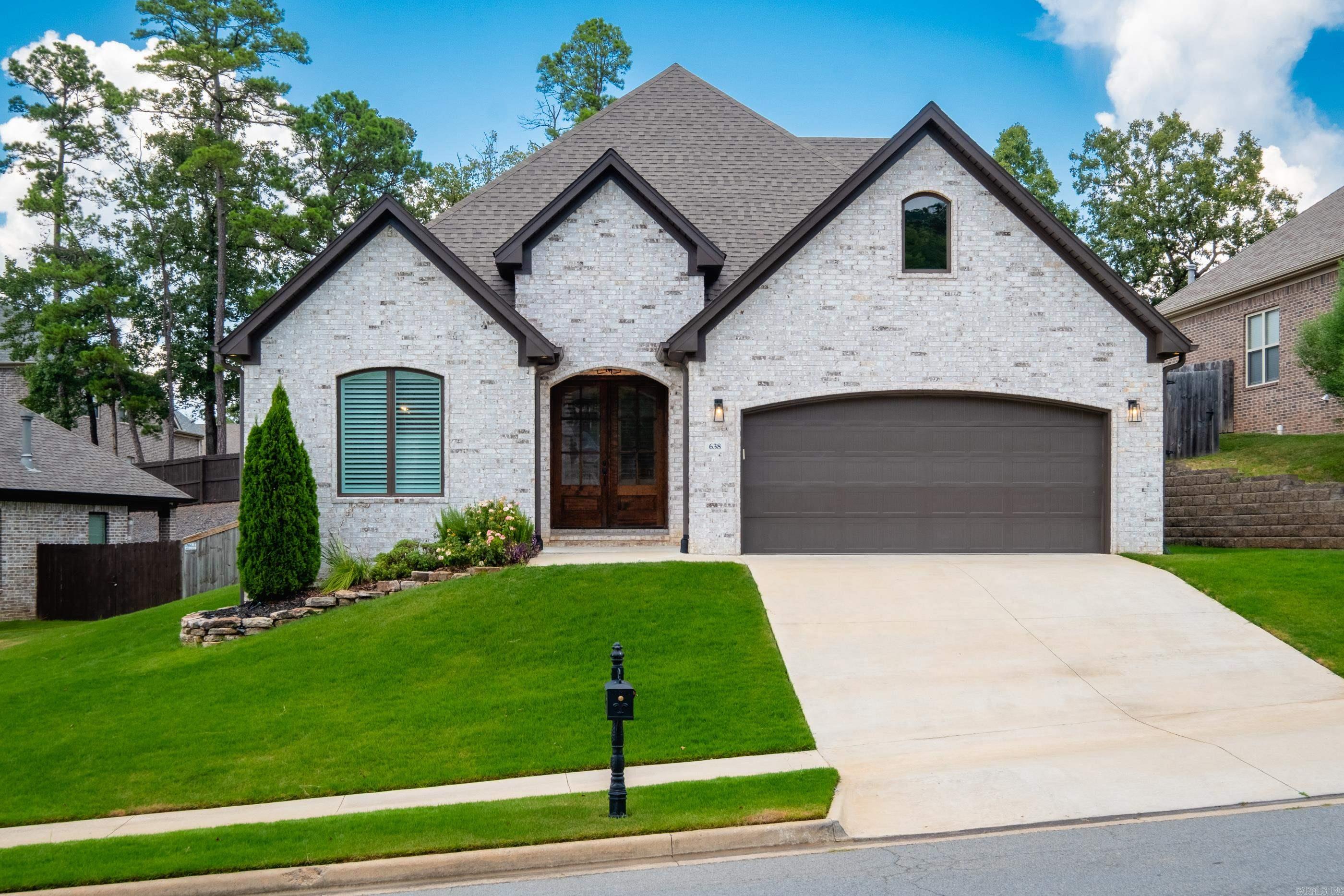 Beautiful home in the Epernay Place subdivision in Chenal Valley. Lives like a one level with the primary suite and additional bedroom and full bath on the main level. 3rd bedroom, and full bath upstairs. Open floor plan with designer finishes. Kitchen complete with gas range, quartz counters, & pantry. Beautiful wood floors in the main living area, oversized walk in closet in the primary suite, shutters on the front windows and roller shades throughout the rest of the home.