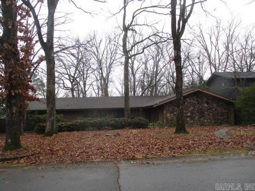 Located off the corner of Oneida St and Ponca St North of the Sherwood city limits features this three bedrooms three bathrooms stone/cedar home. The bonus room by the front door can be used as an office and the den with a nice built-in fireplace are nice bonus. Home is between Sherwood and Jacksonville in the Indianhead Lake Subdivision. Call today for details ... log on www.hudhomestore.gov to submit offers and www.olympusams-at.com for management information. HUD case  #031-413849 - "HUD homes are sold AS IS".