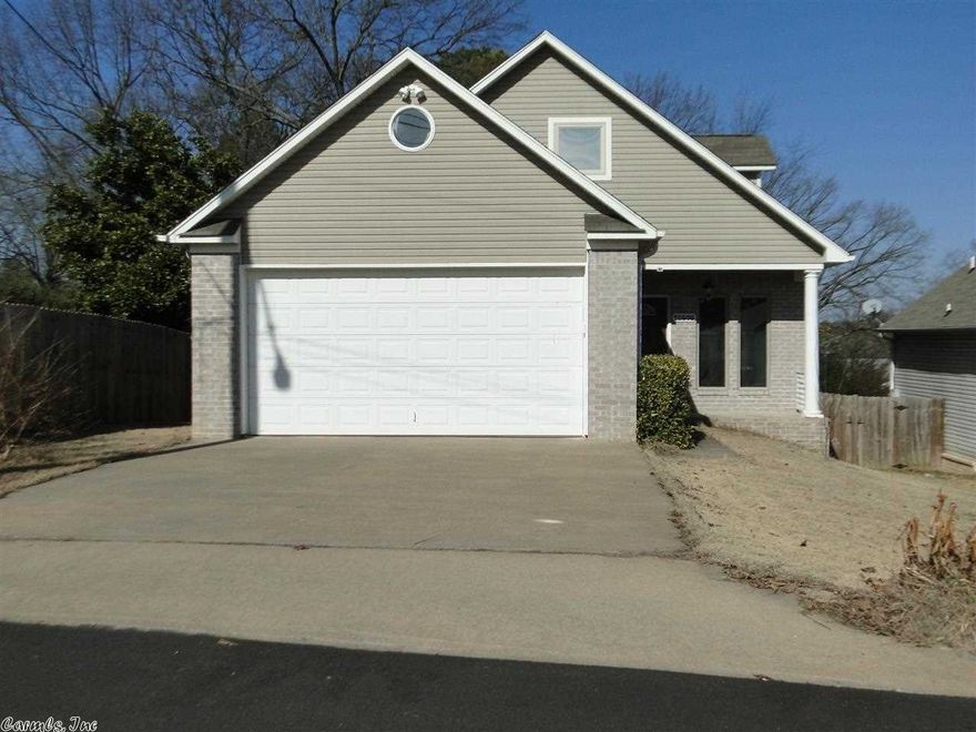 Immaculate two story home with 9’ ceilings has so much to offer.  The great room has a corner gas log fireplace. It opens into the kitchen and dining that has tile flooring and tile counters. The kitchen has SS gas range, built in microwave and dishwasher. The half bath is perfectly placed under the staircase utilizing every sf of space.  Spacious main level master suite & luxury bath with accent columns has jetted tub, walk in shower & double vanity.  Up is two large bedrooms & bath. Fully fenced backyard.