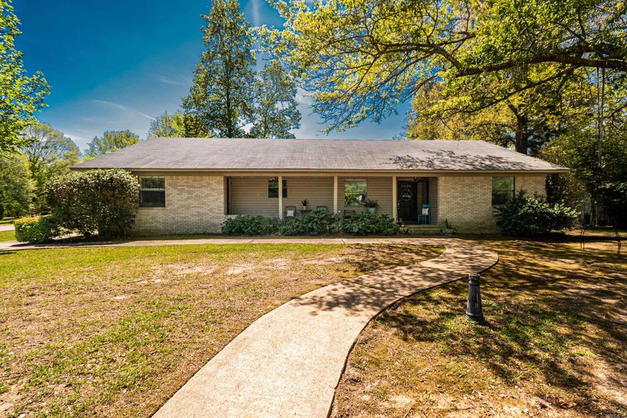 Space, flexibility, and a great location come together at 1305 Cypress, offering room to live, gather, and enjoy everyday life.  This 4-bedroom, 3-bath home with 3,187 square feet is located in the Racquet Club area, known for its convenient access to shopping, dining, and everyday amenities. Inside, you’ll find a spacious layout designed for comfortable living, with plenty of room to gather, relax, or entertain.  One of the standout features of this home is the sunroom, offering a bright and inviting space that can be enjoyed year-round...perfect for relaxing, reading, or hosting guests.  The flexible floorplan includes a private guest bedroom with its own en suite bathroom, making it ideal for guests or extended stays and adding valuable versatility to the home.  Step outside to enjoy the fenced backyard, complete with a storage building for added convenience. The two-car garage provides everyday functionality and additional storage.  With its generous square footage, flexible layout, private guest suite, and sought-after Racquet Club location, 1305 Cypress offers the space and features buyers are looking for in today’s market