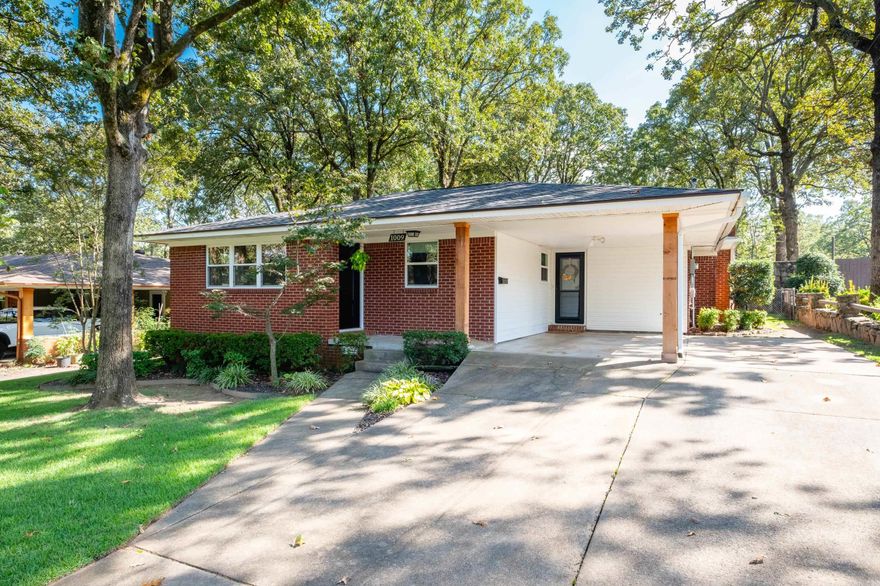 Wonderfully updated home in Sherwood on one level and a large lot! The kitchen is open to the living room and has been recently updated with custom cabinets, quartz countertops and stainless steel appliances. The den is very cozy with a wood burning fireplace. All new luxury vinyl floors throughout the main areas with site finished hardwood floors in the bedroom. Both bathrooms have been updated. The yard is very large with a screened in pation and also has a 280 square foot detached building with an HVAC that would be great as a workout facility, man cave or office. The backyard also has a storage building. New windows, roof, doors and fixtures.