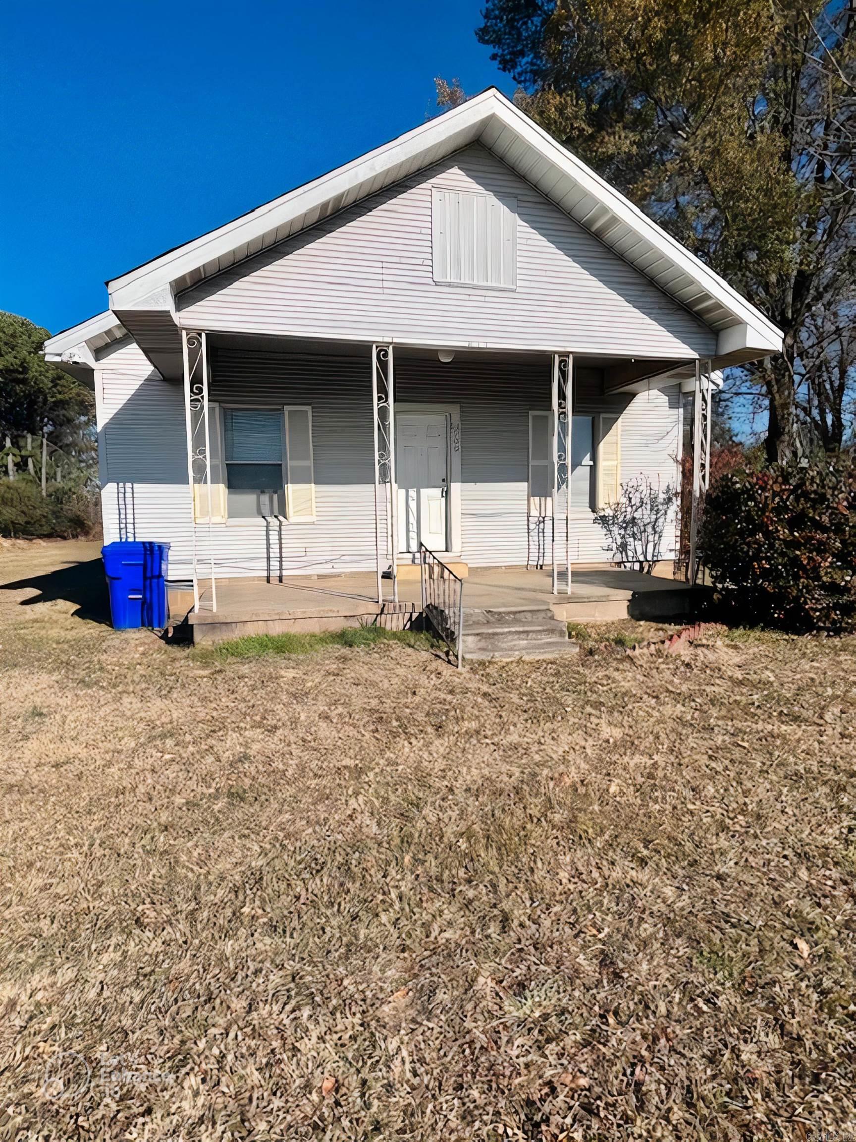 Great Location Close to Everything. Oversized lot with quaint little 2 bed 1 bath home. Great covered front porch.