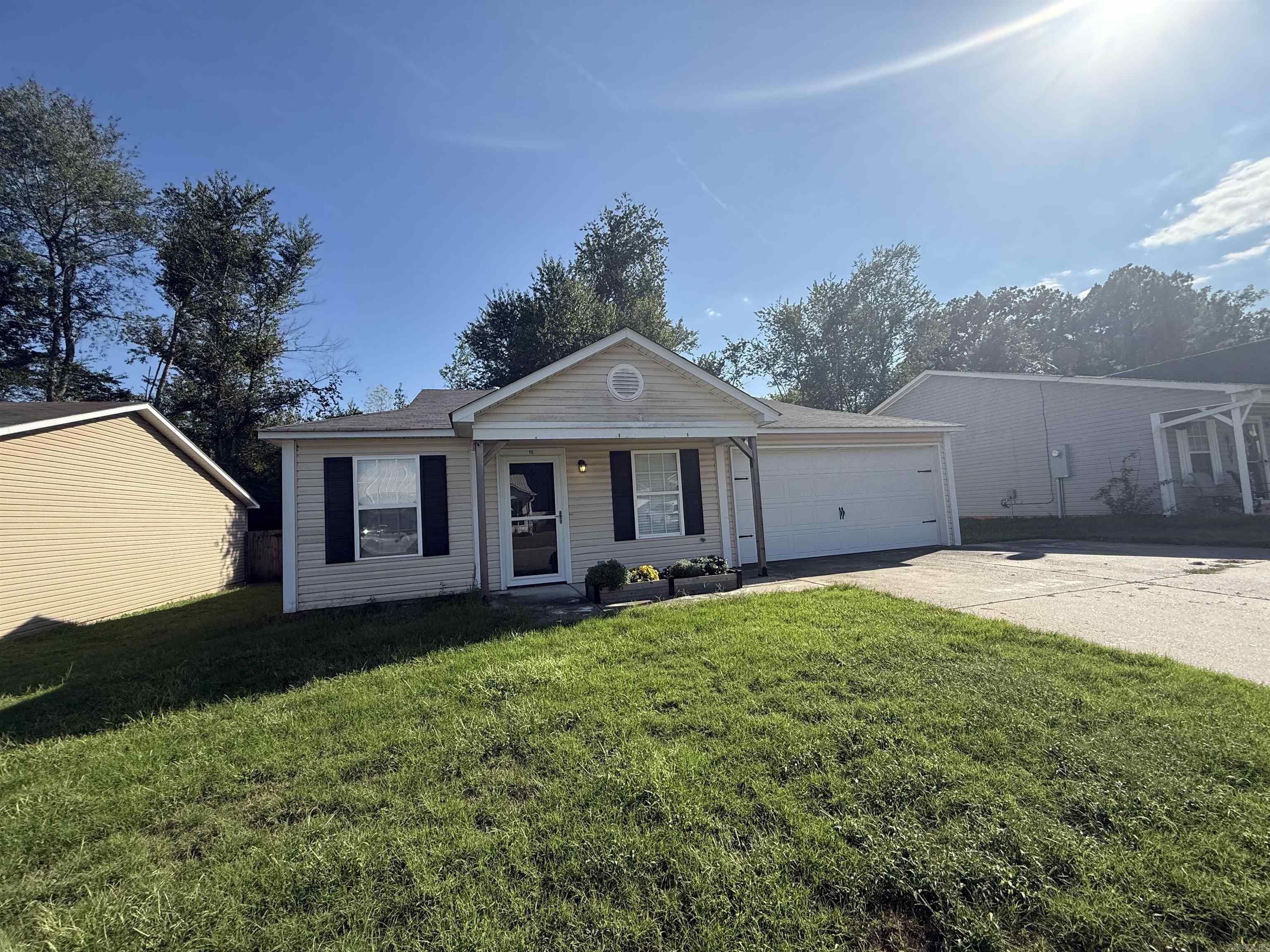 Welcome to this charming 3-bedroom, 2-bathroom home located in the desirable area of Haskell, AR. This lovely house offers a comfortable and inviting atmosphere for anyone looking to settle down. As you step inside, you'll immediately notice the fresh paint and the absence of carpet, providing a clean and modern feel throughout. The fully fenced yard ensures privacy and security, perfect for those who enjoy spending time outdoors. The kitchen comes equipped with a refrigerator, making it convenient for storing and preparing your favorite meals. Additionally, a washer and dryer are provided, eliminating the hassle of finding a laundromat or purchasing your own appliances. With a garage included, you'll have ample space for parking and storage.